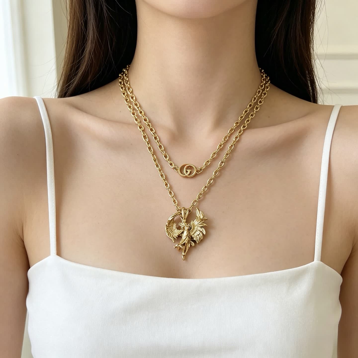 Gucci Gold Winged Figure Pendant Necklace
