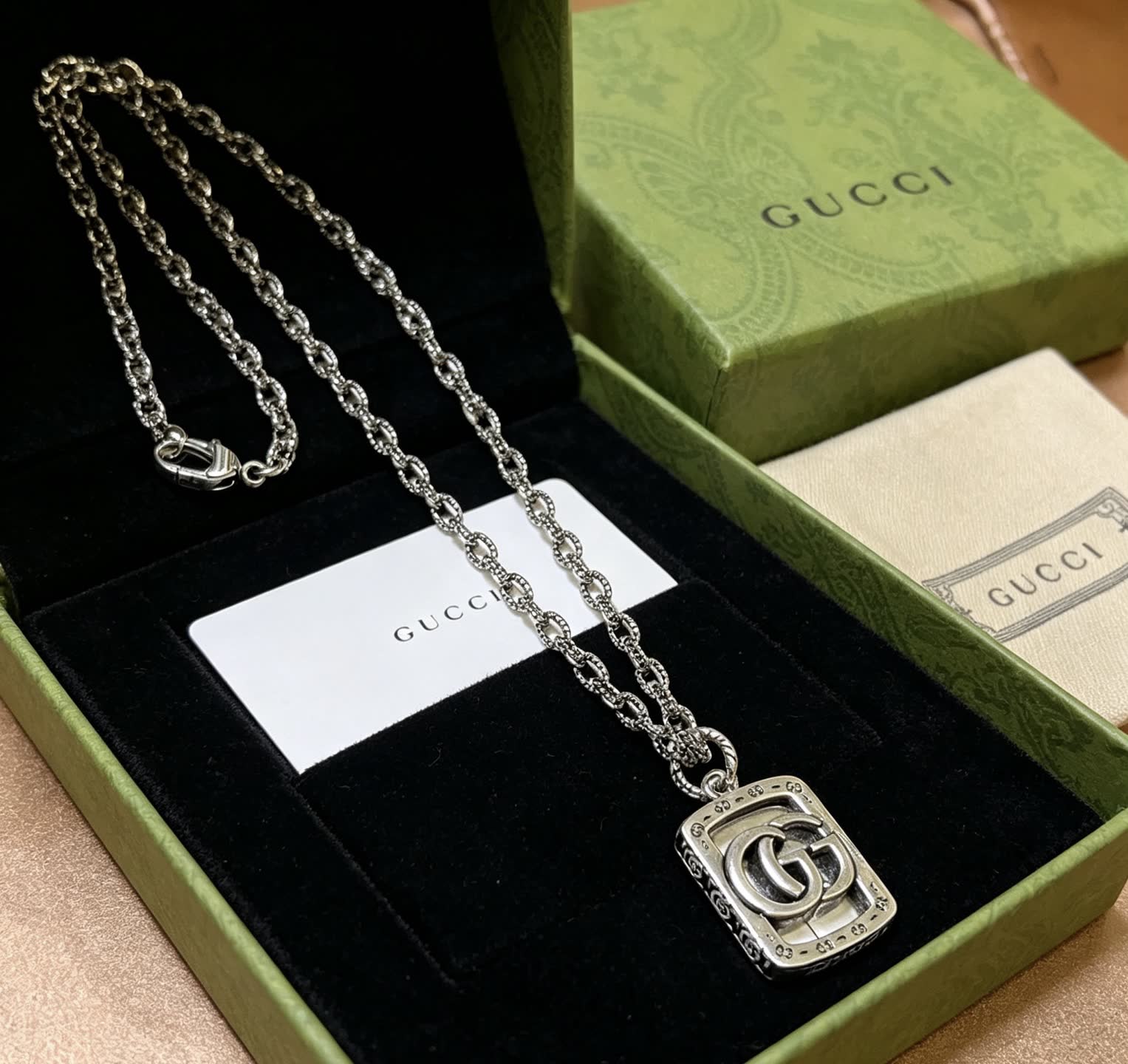 Gucci Silver Tone Interlocking G Pendant Necklace