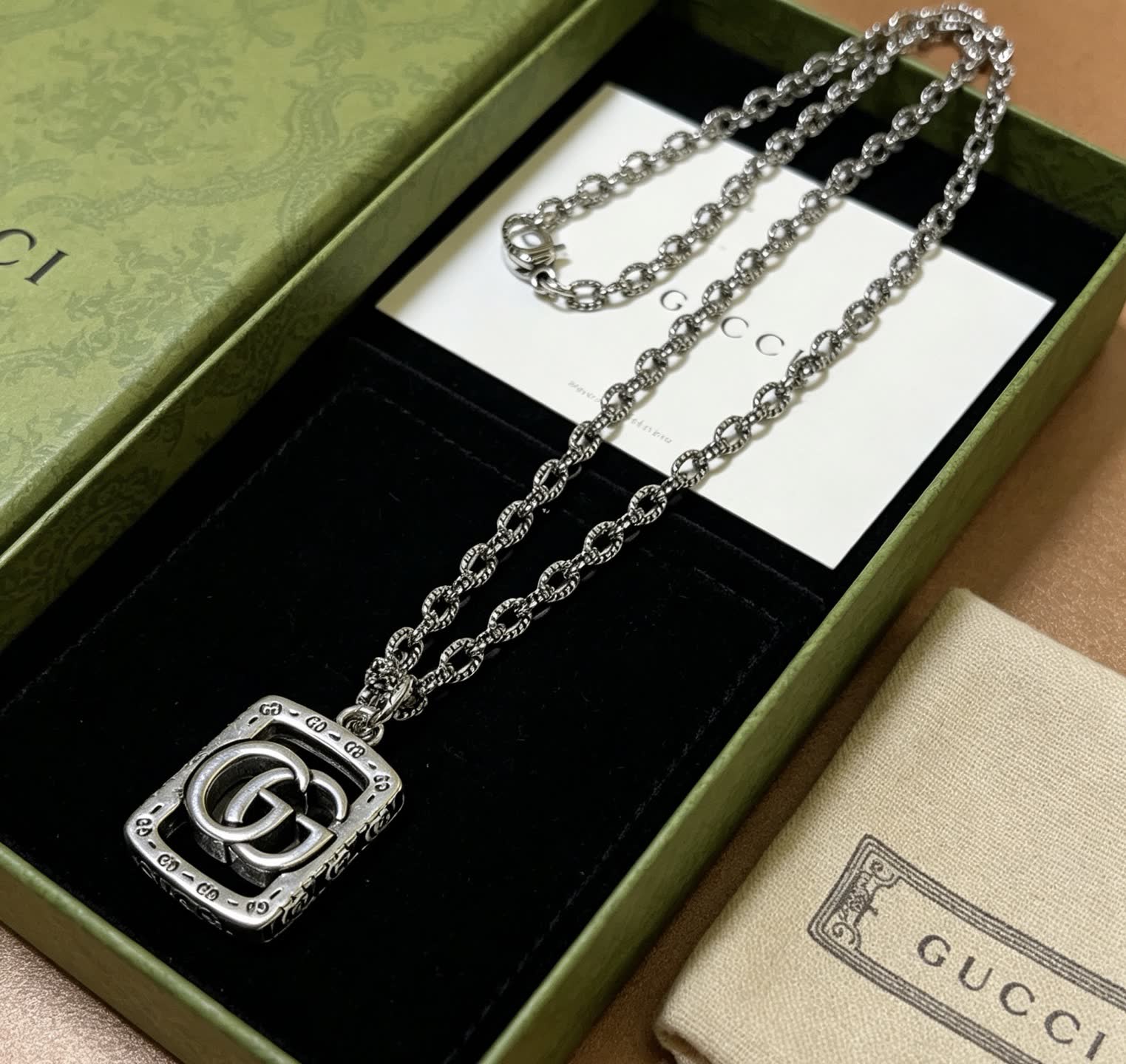 Gucci Silver Tone Interlocking G Pendant Necklace