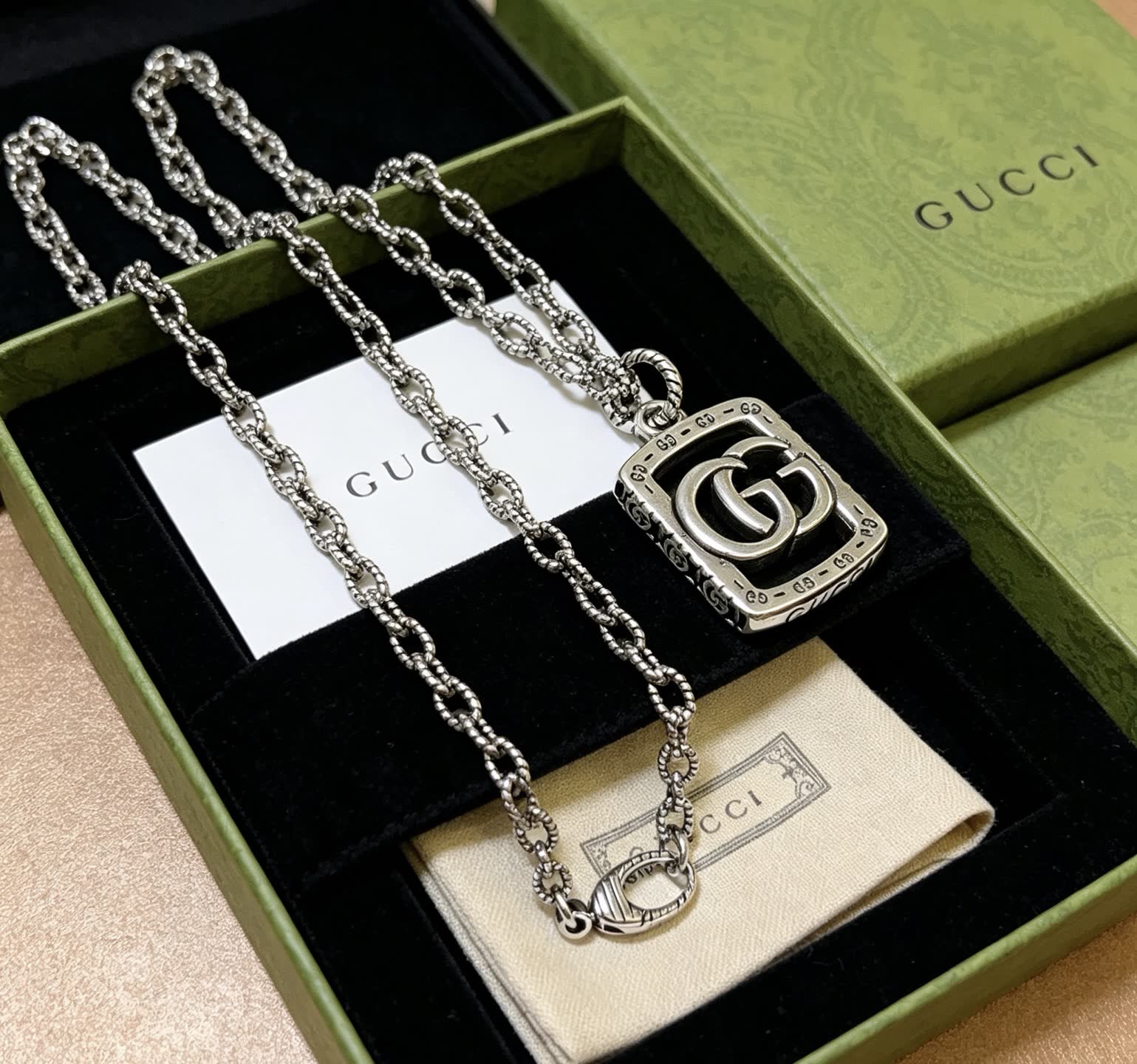 Gucci Silver Tone Interlocking G Pendant Necklace