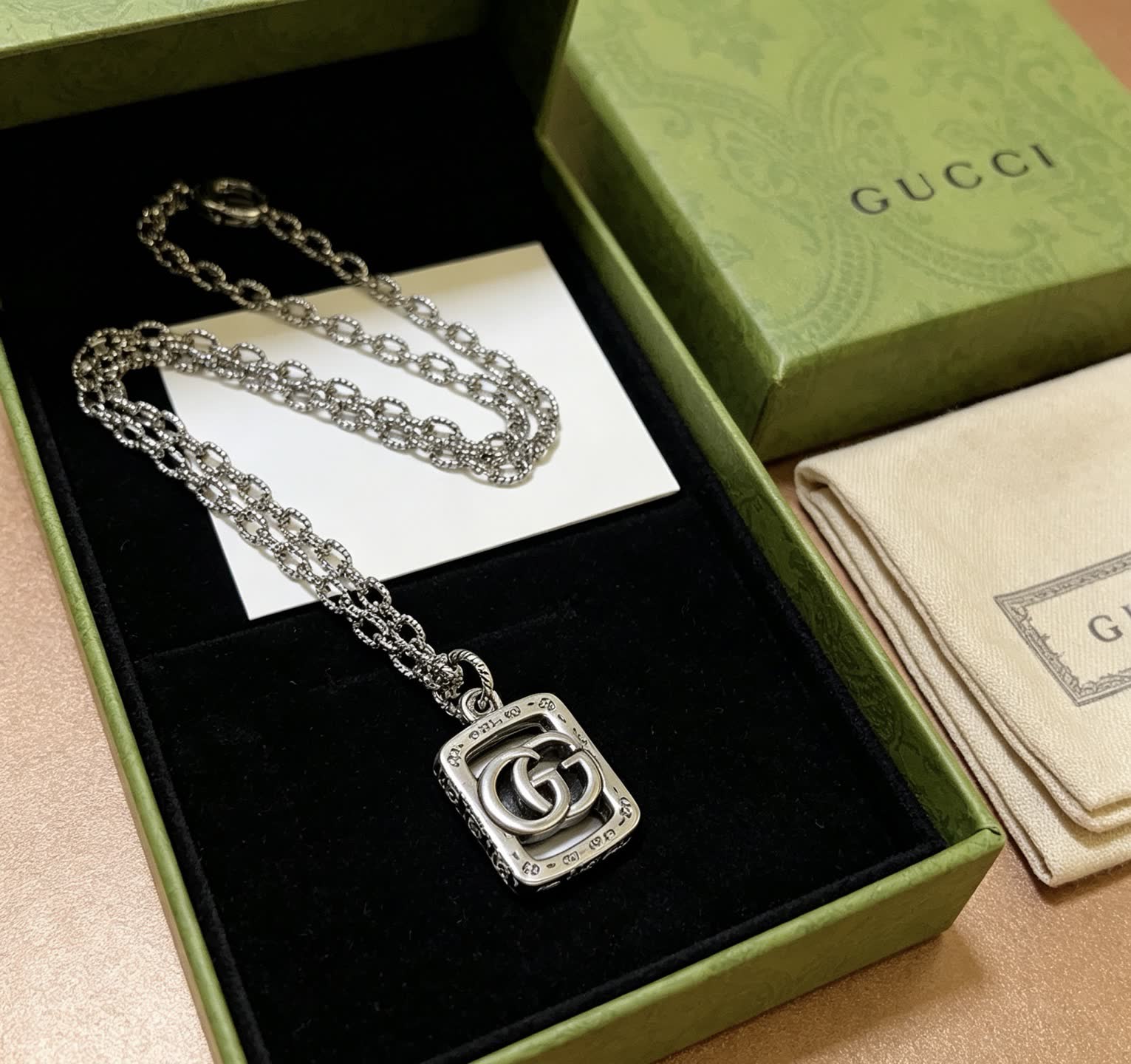 Gucci Silver Tone Interlocking G Pendant Necklace