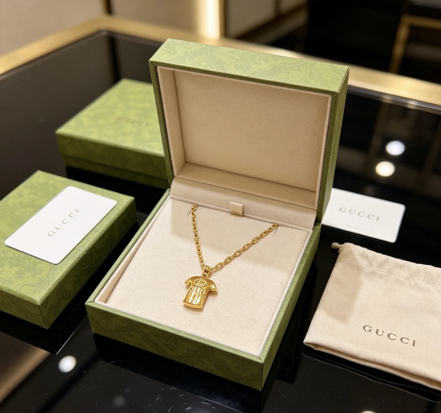 Gucci Gold Chain with T-shirt Pendant