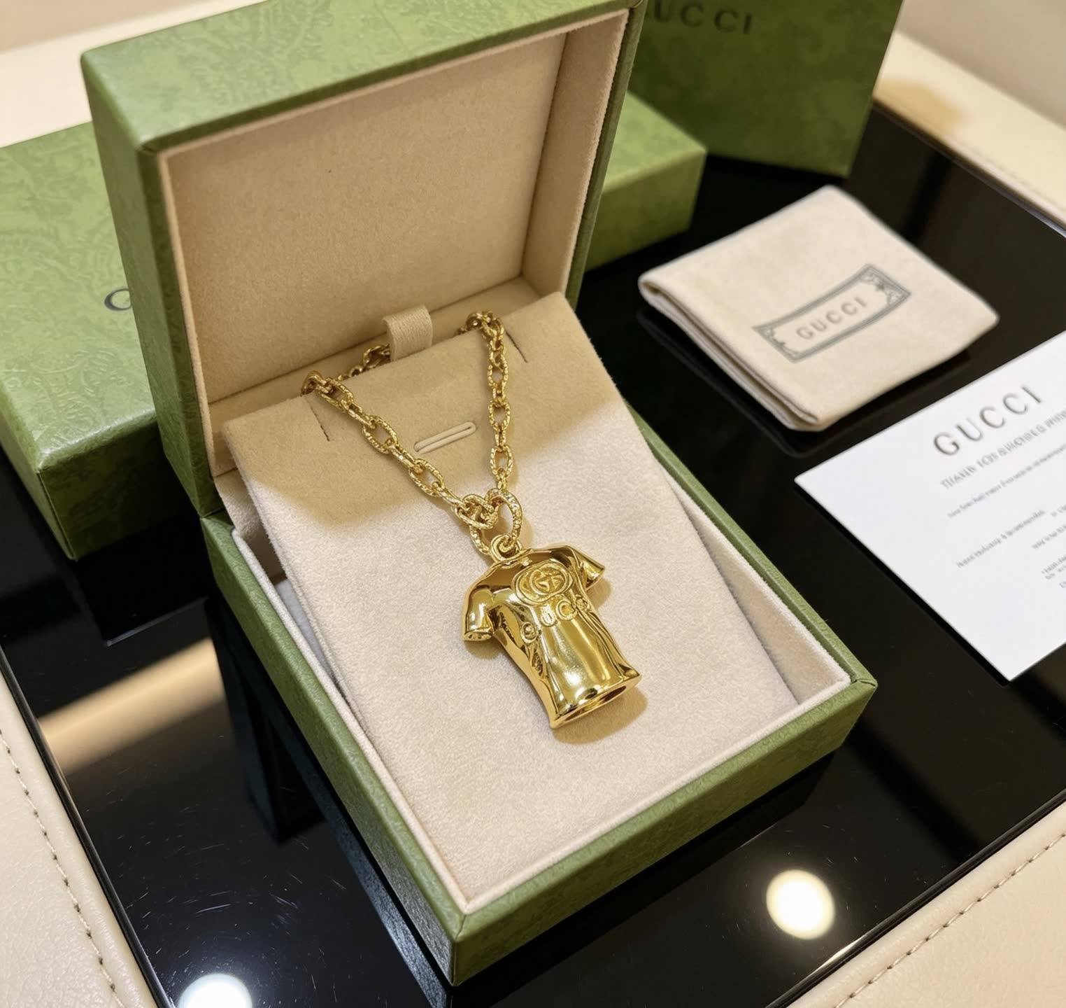 Gucci Gold Chain with T-shirt Pendant