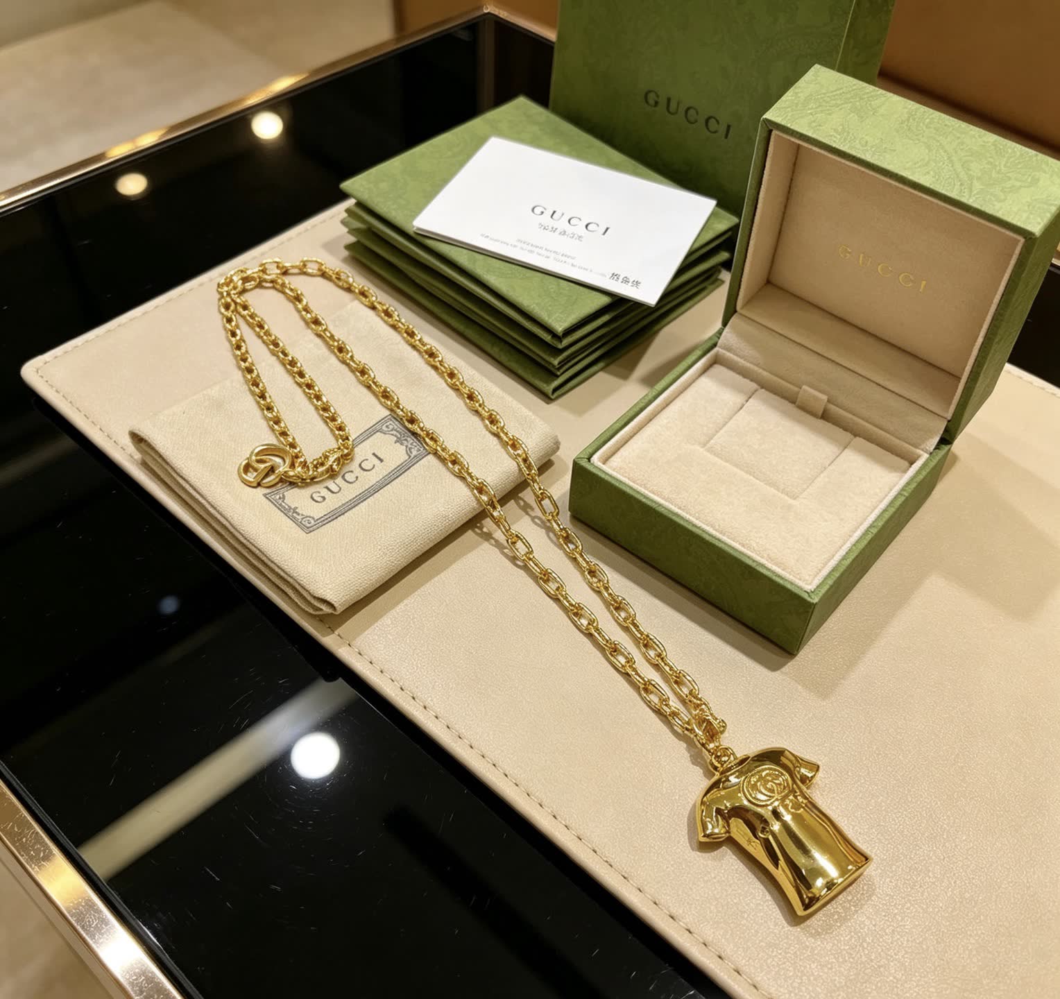 Gucci Gold Chain with T-shirt Pendant