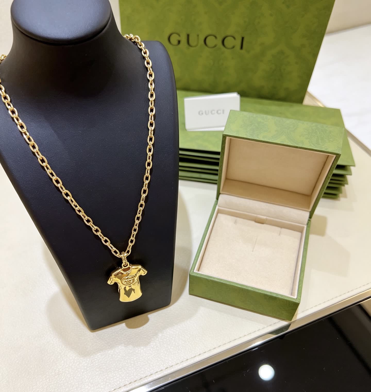 Gucci Gold Chain with T-shirt Pendant