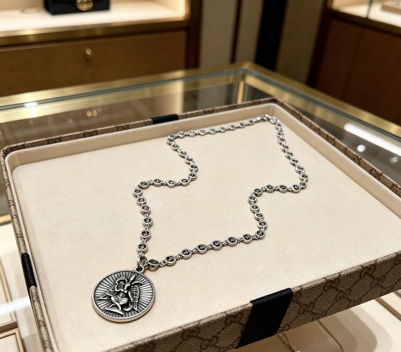 Gucci Silver Medallion Necklace