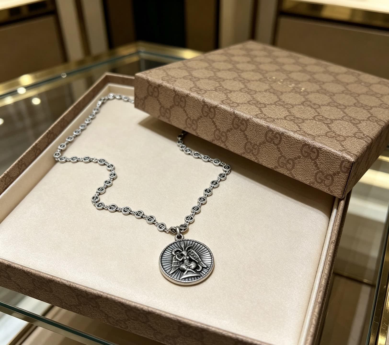 Gucci Silver Medallion Necklace