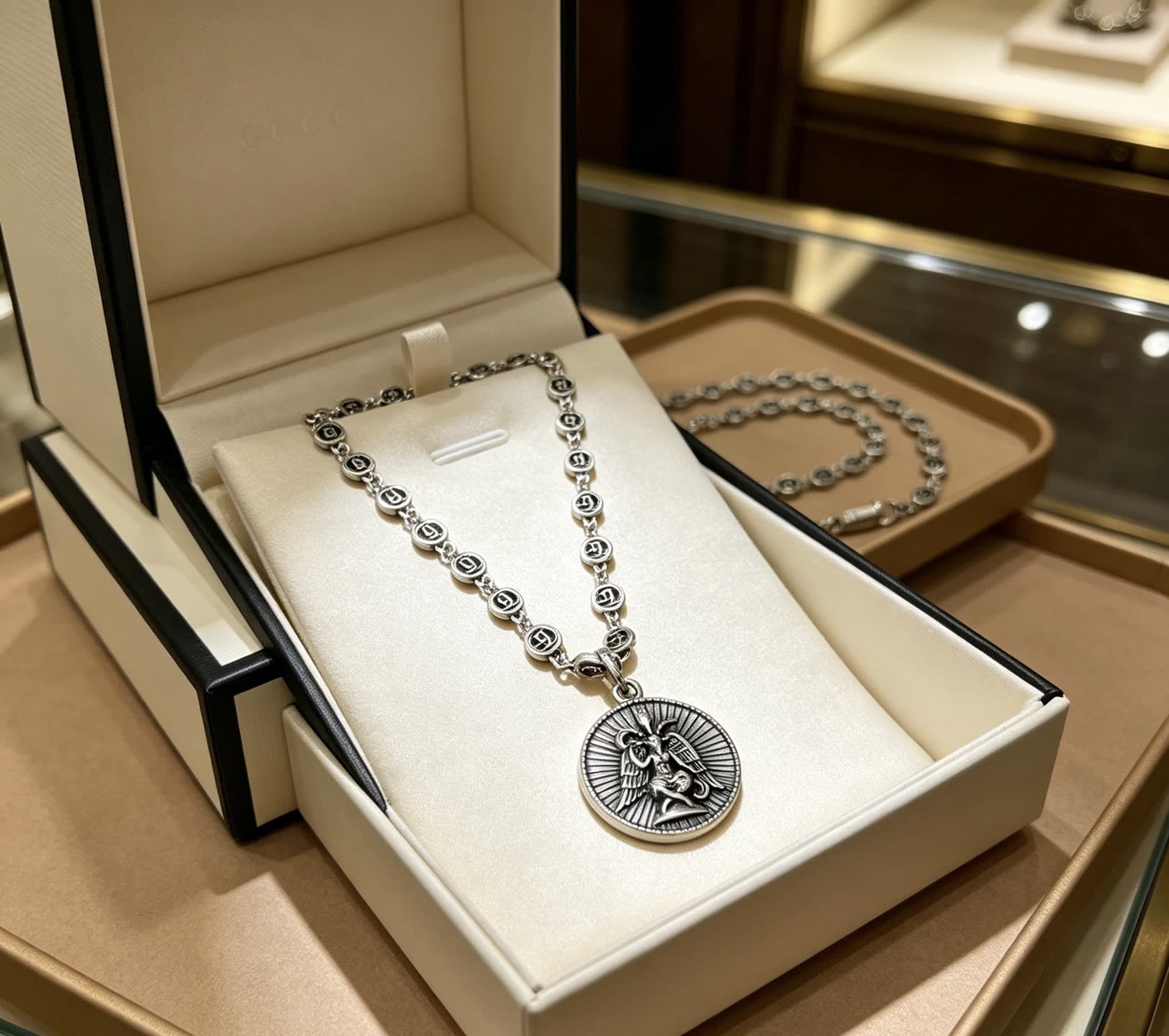 Gucci Silver Medallion Necklace