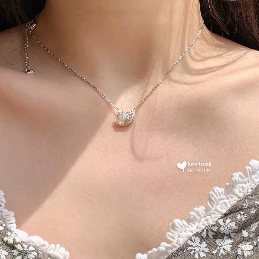 Swarovski Classic Gradual Change Swan Lock Bone Necklace