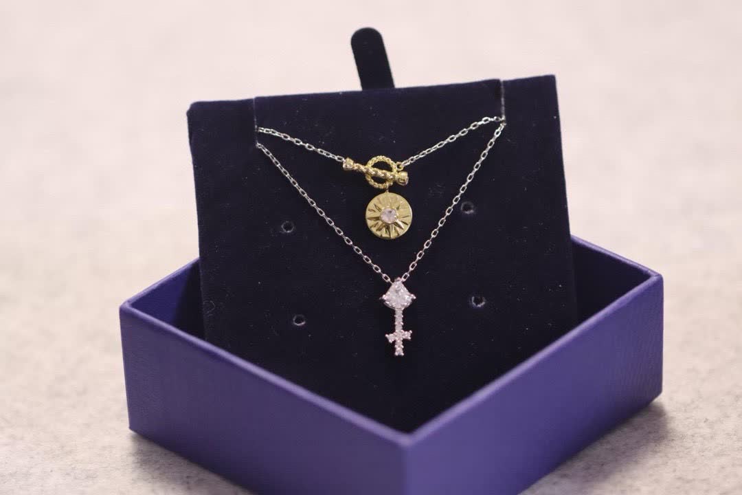 Swarovski Elegant Silver and Gold-Tone Necklace Set