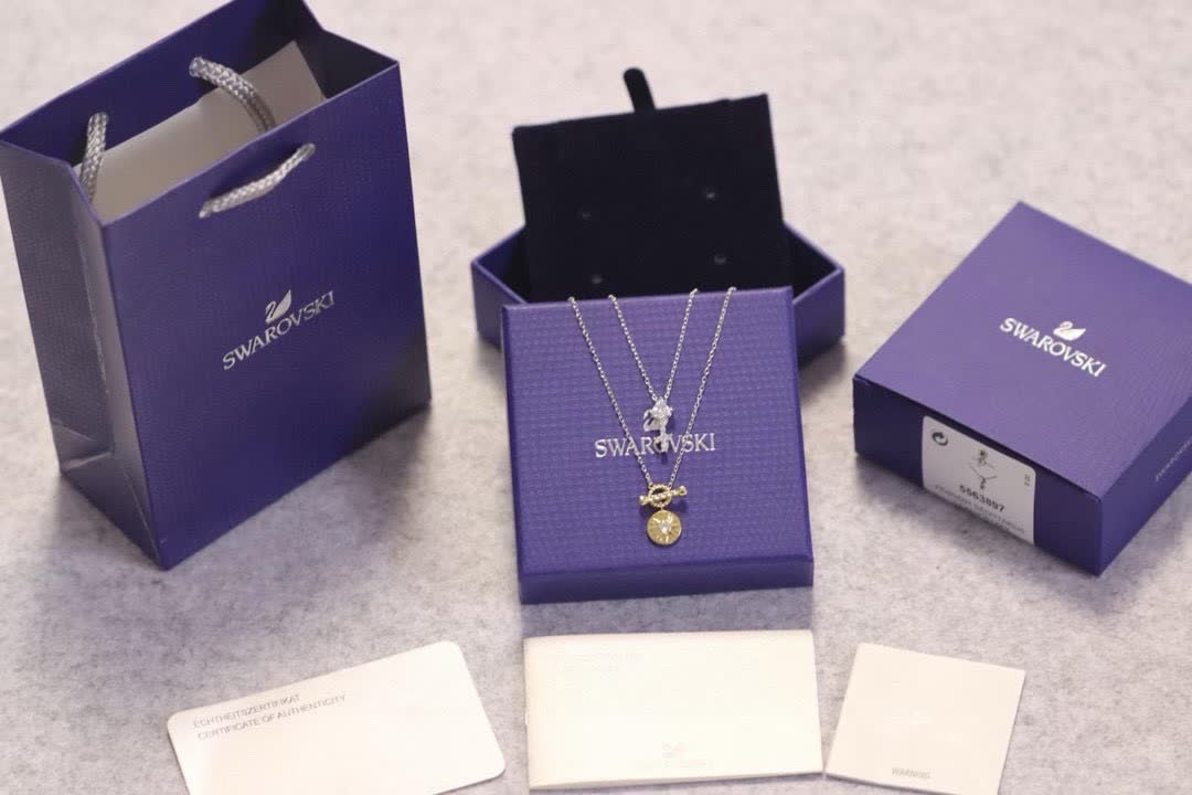 Swarovski Elegant Silver and Gold-Tone Necklace Set