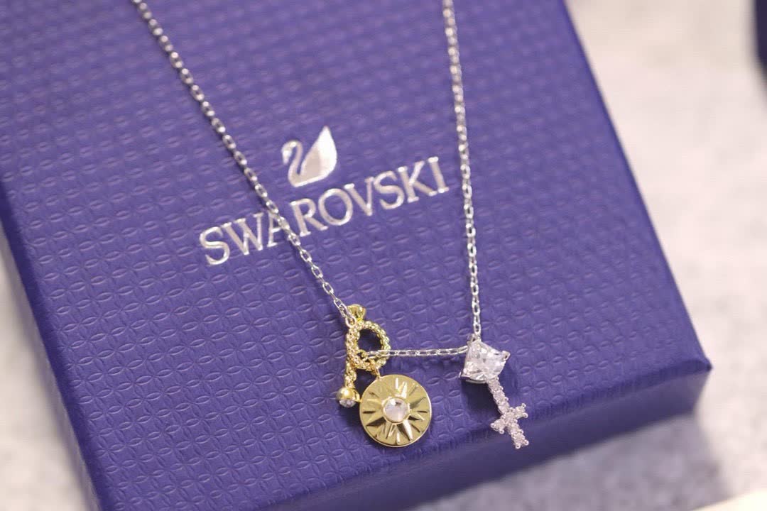 Swarovski Elegant Silver and Gold-Tone Necklace Set