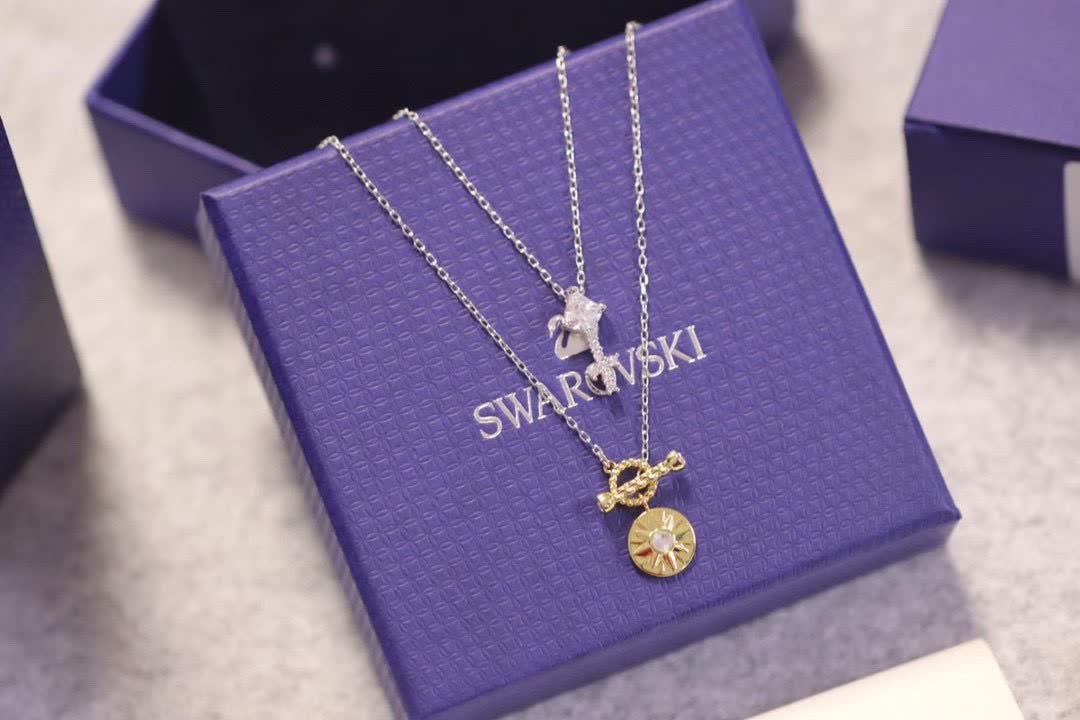 Swarovski Elegant Silver and Gold-Tone Necklace Set