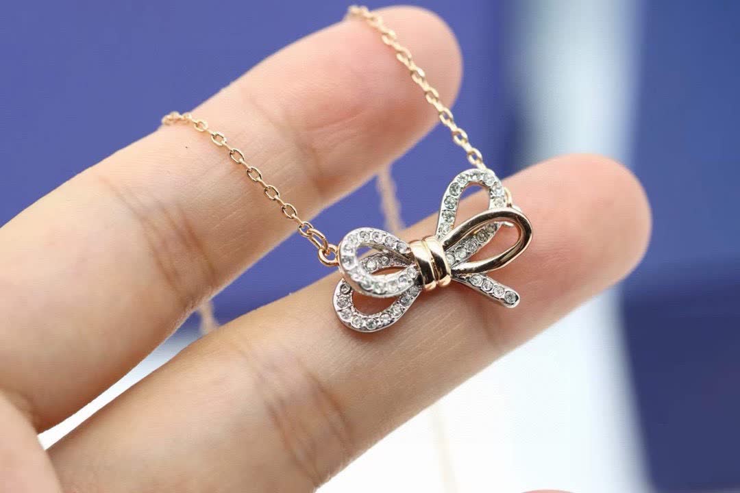 Swarovski Gold-Tone Crystal Bow Necklace