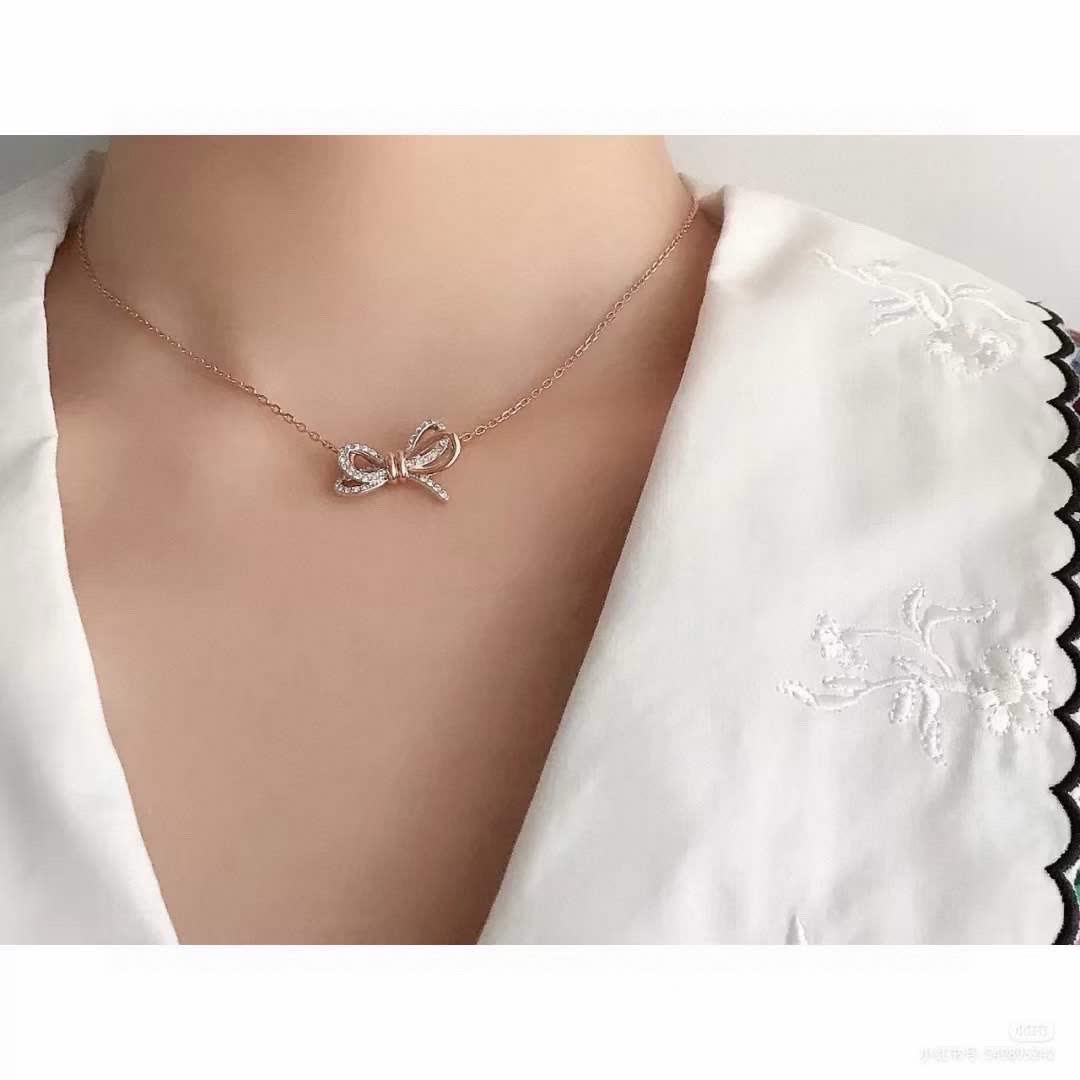 Swarovski Gold-Tone Crystal Bow Necklace