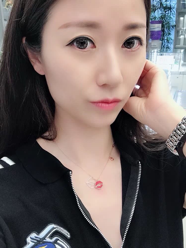Swarovski Lip and Leaf Pendant Necklace