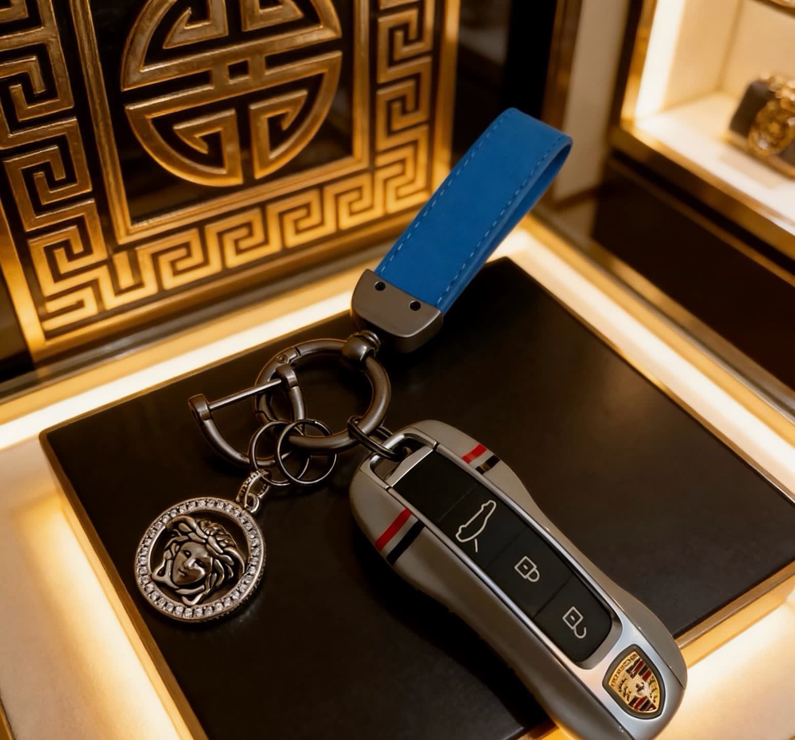 Versace Porsche Keychain with Blue Strap and Lion Pendant