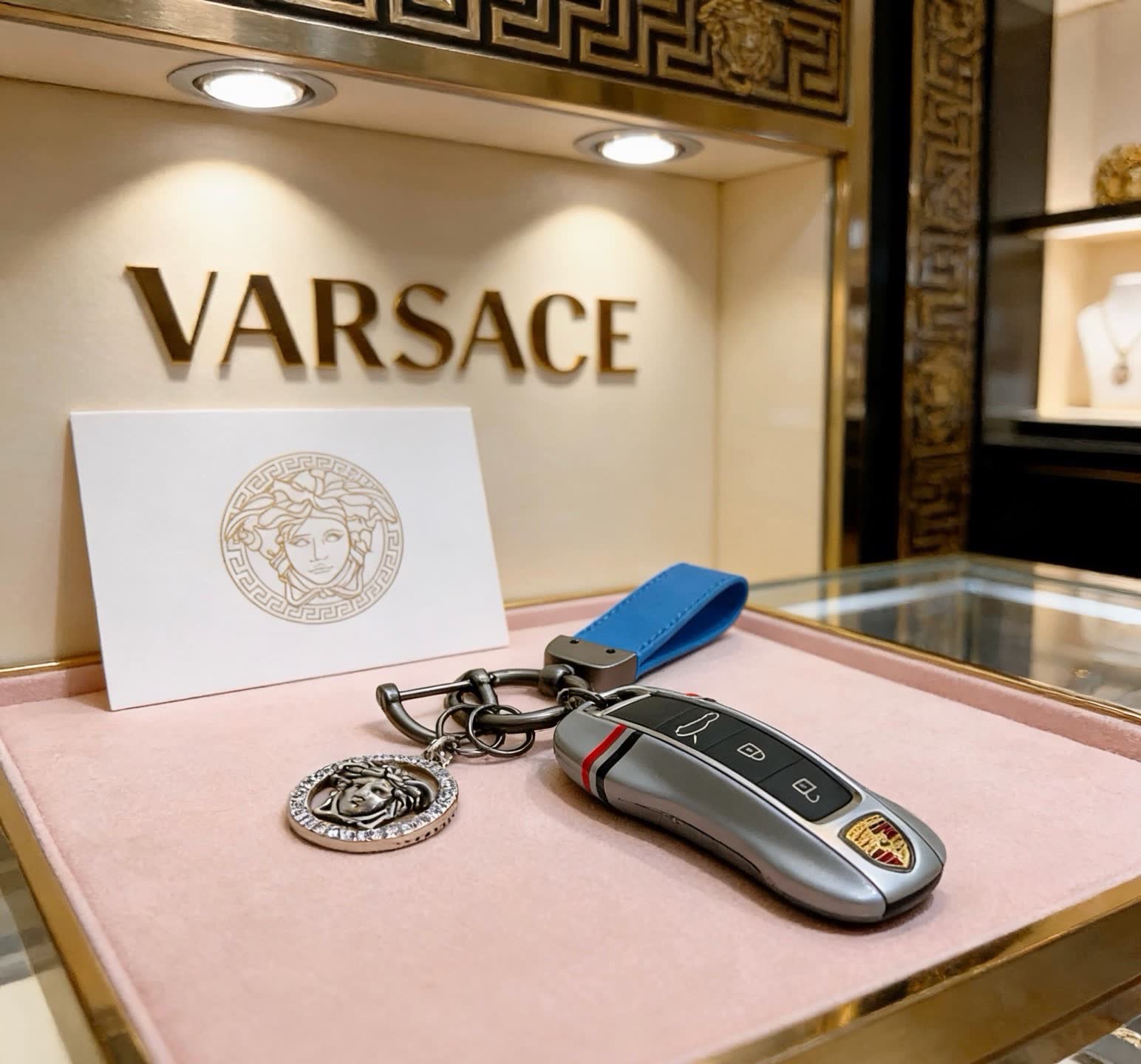 Versace Porsche Keychain with Blue Strap and Lion Pendant