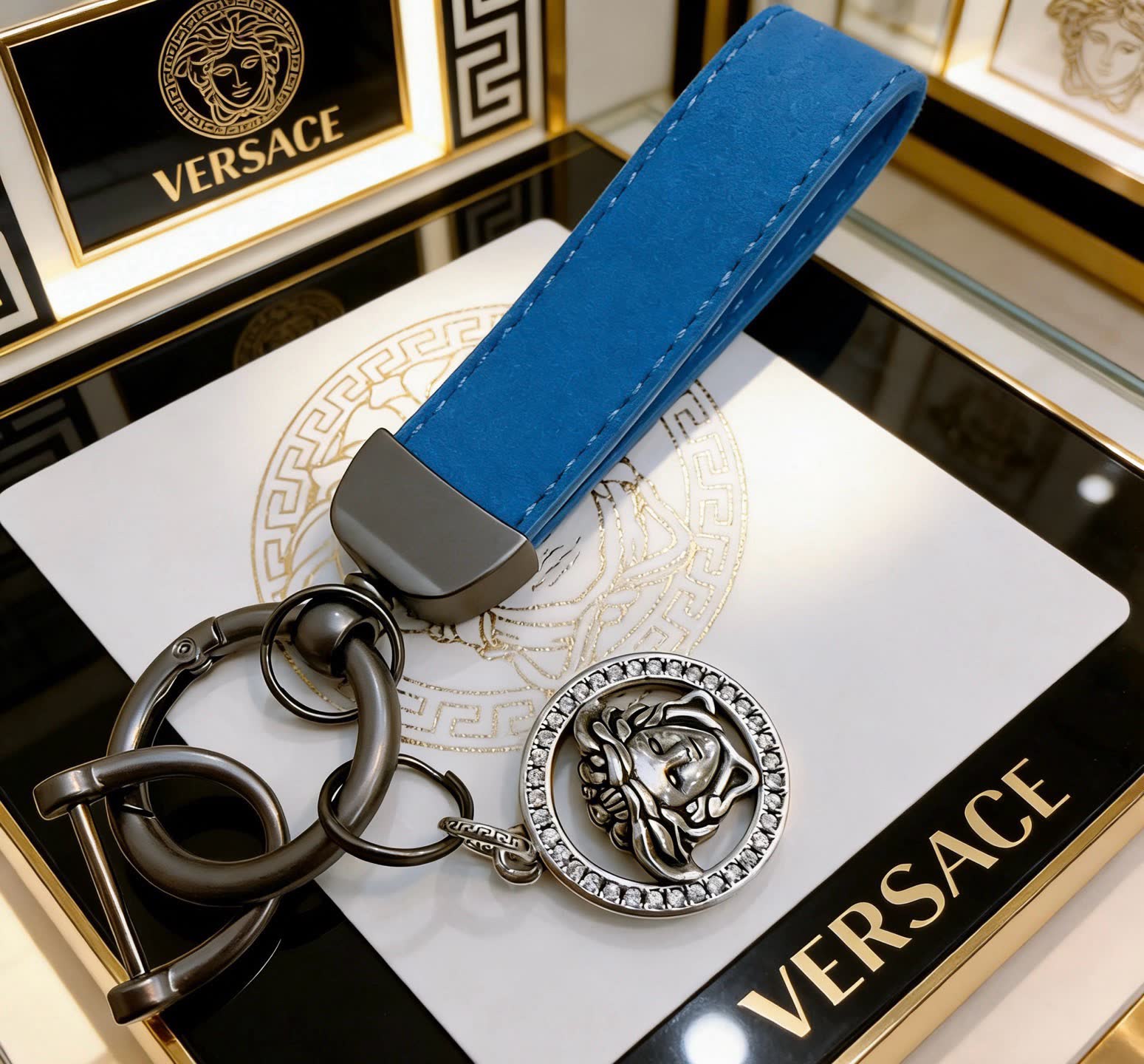 Versace Porsche Keychain with Blue Strap and Lion Pendant