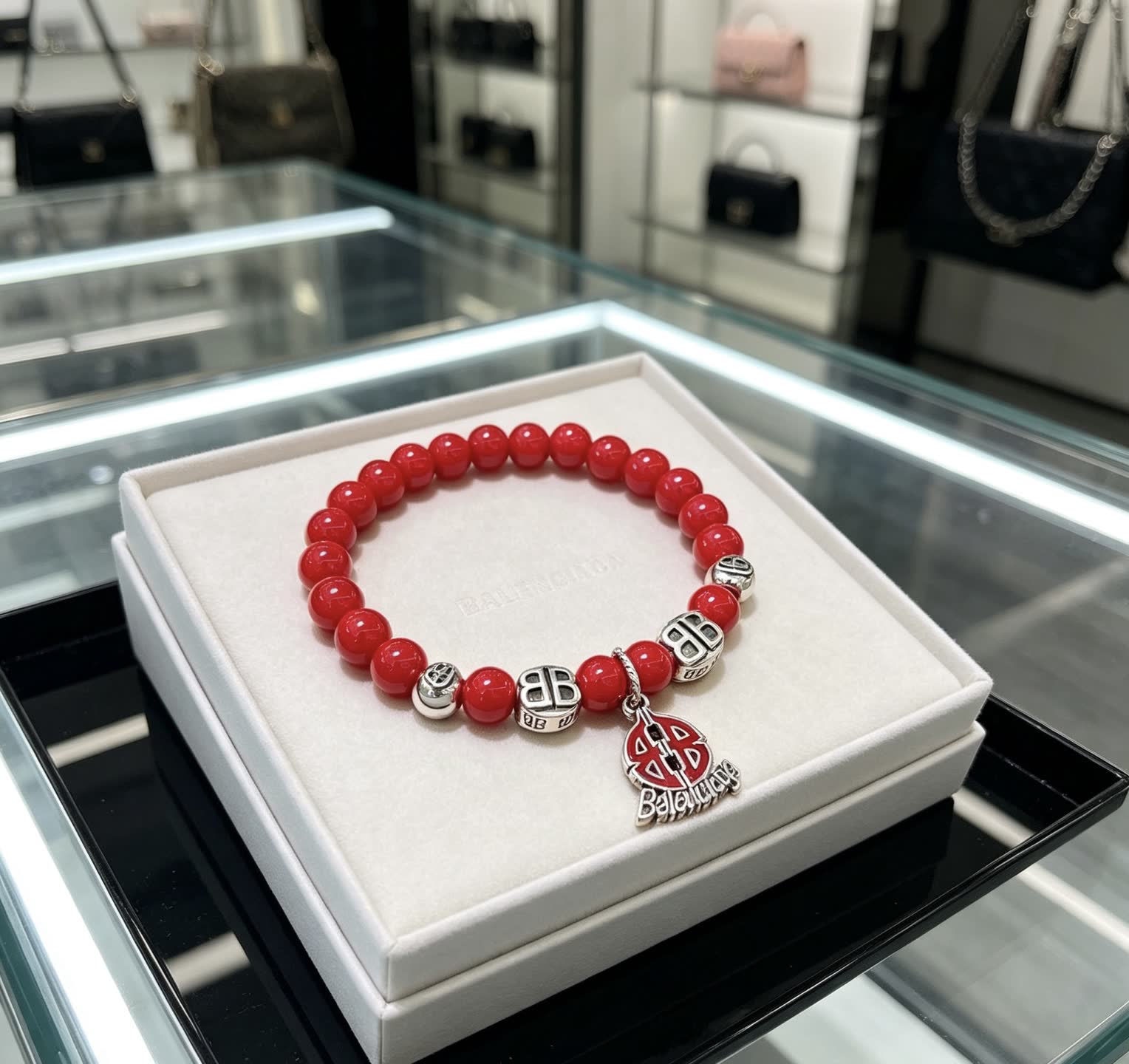 Balenciaga Red Beaded Bracelet with Logo Charm