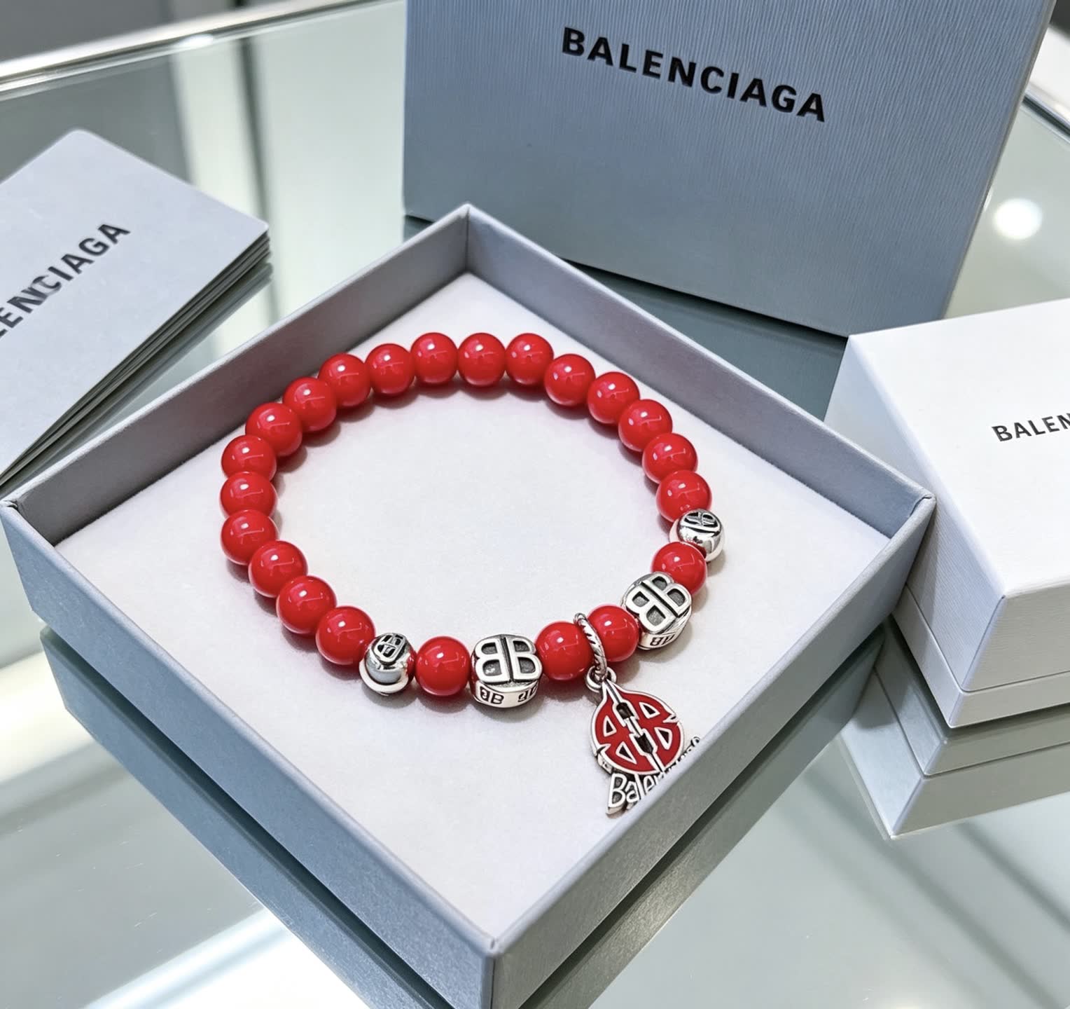 Balenciaga Red Beaded Bracelet with Logo Charm
