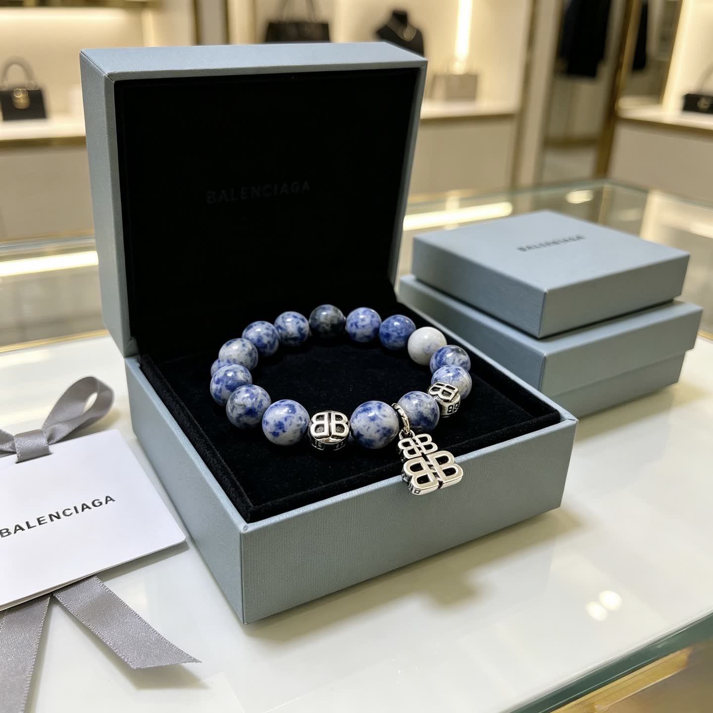 Balenciaga Blue Beaded Bracelet with Logo Charms