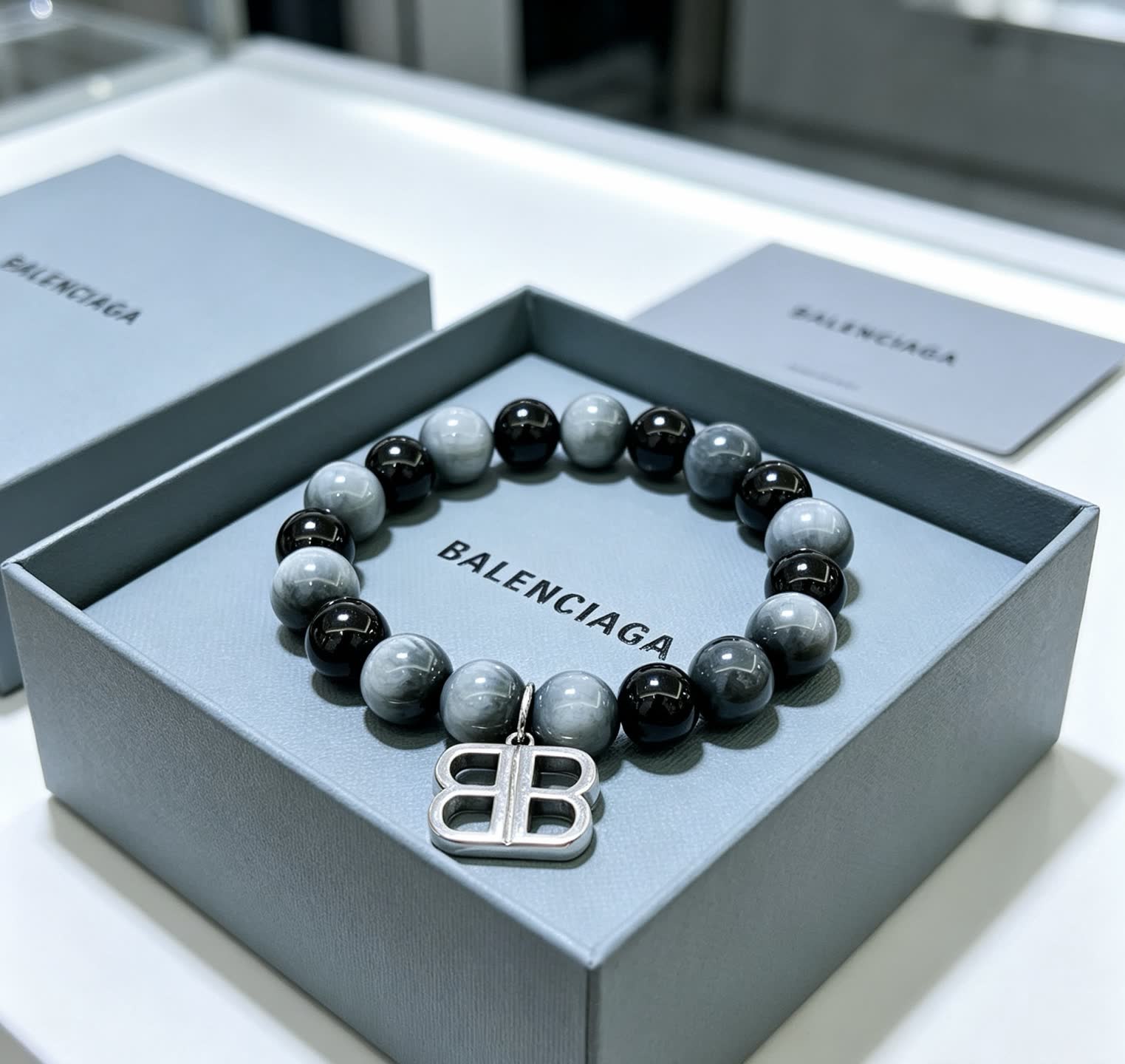 Balenciaga Beaded Bracelet with Logo Charm Balenciaga Beaded Bracelet with Logo Charm