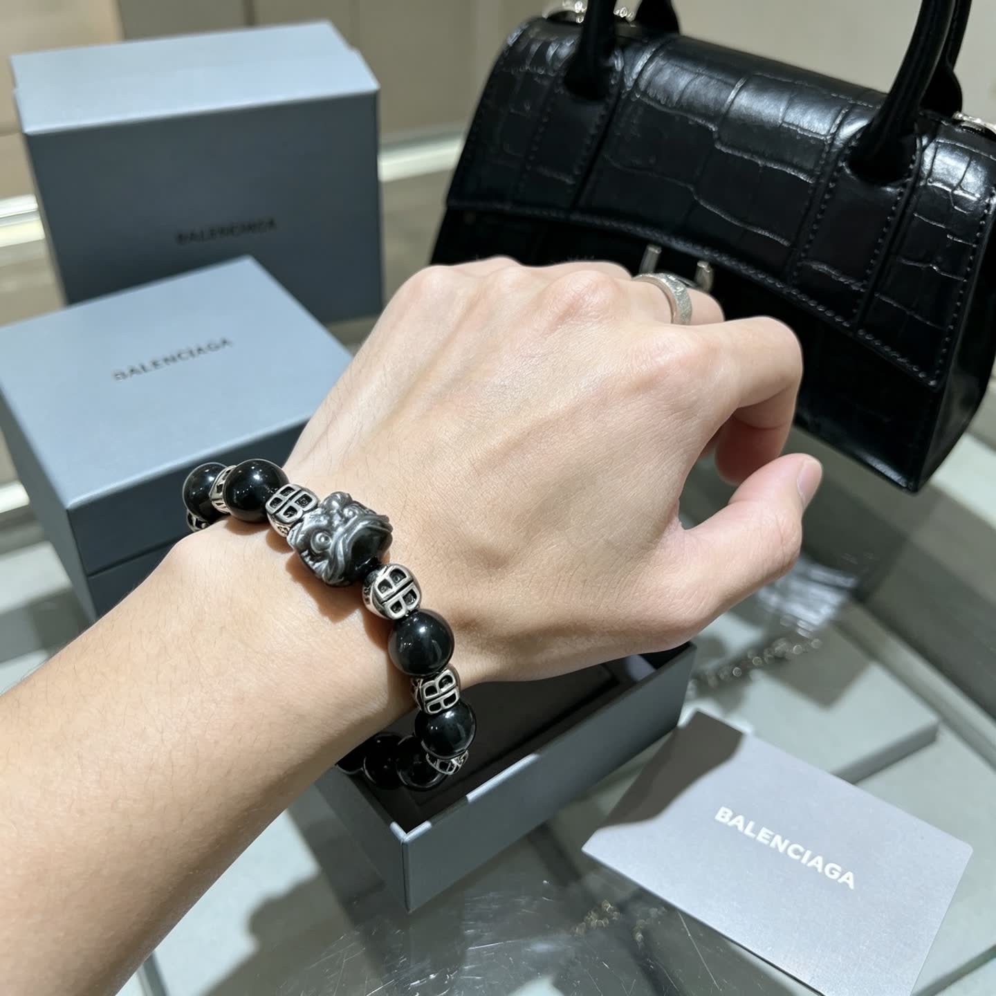 Balenciaga Black Beaded Bracelet with Lion Clasp