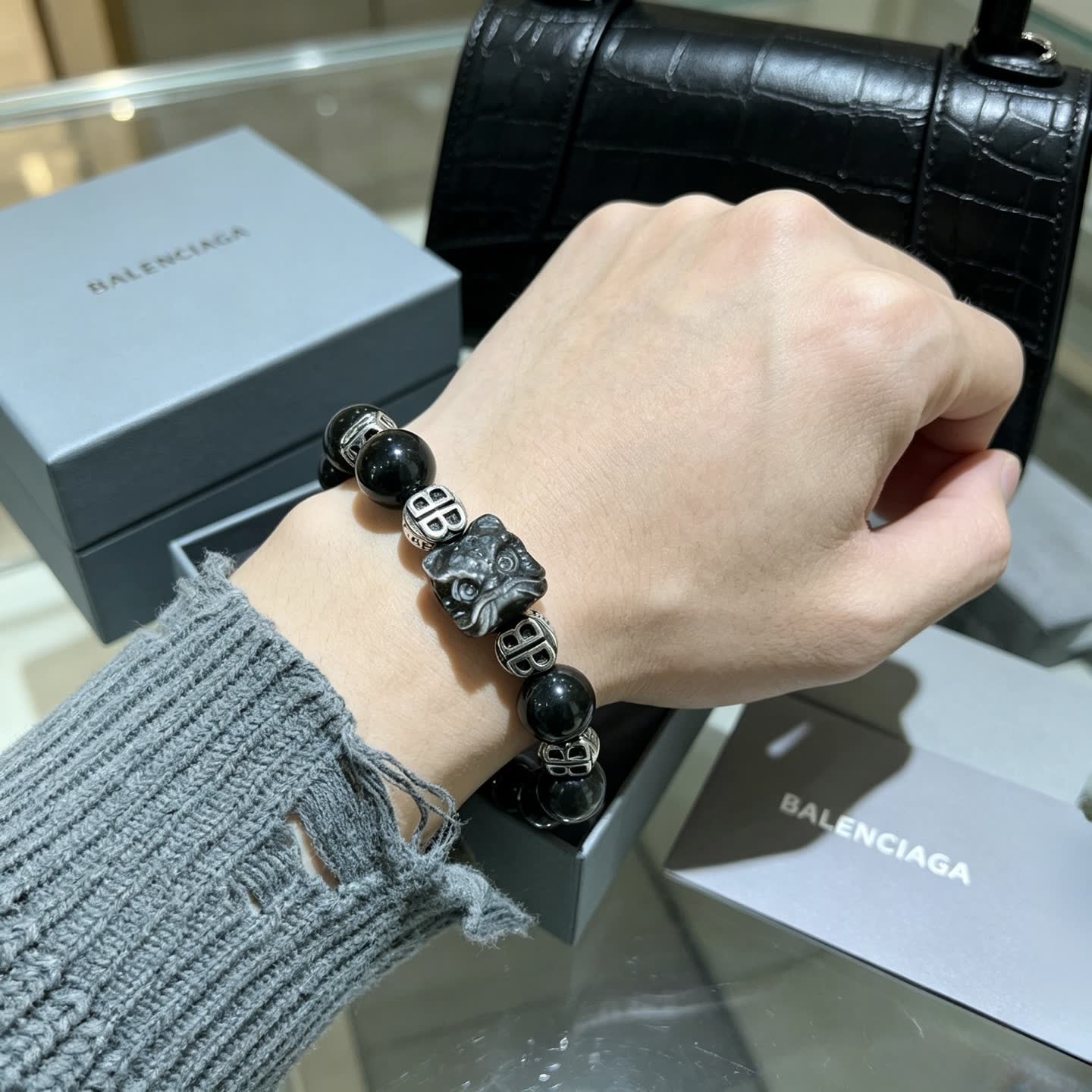 Balenciaga Black Beaded Bracelet with Lion Clasp
