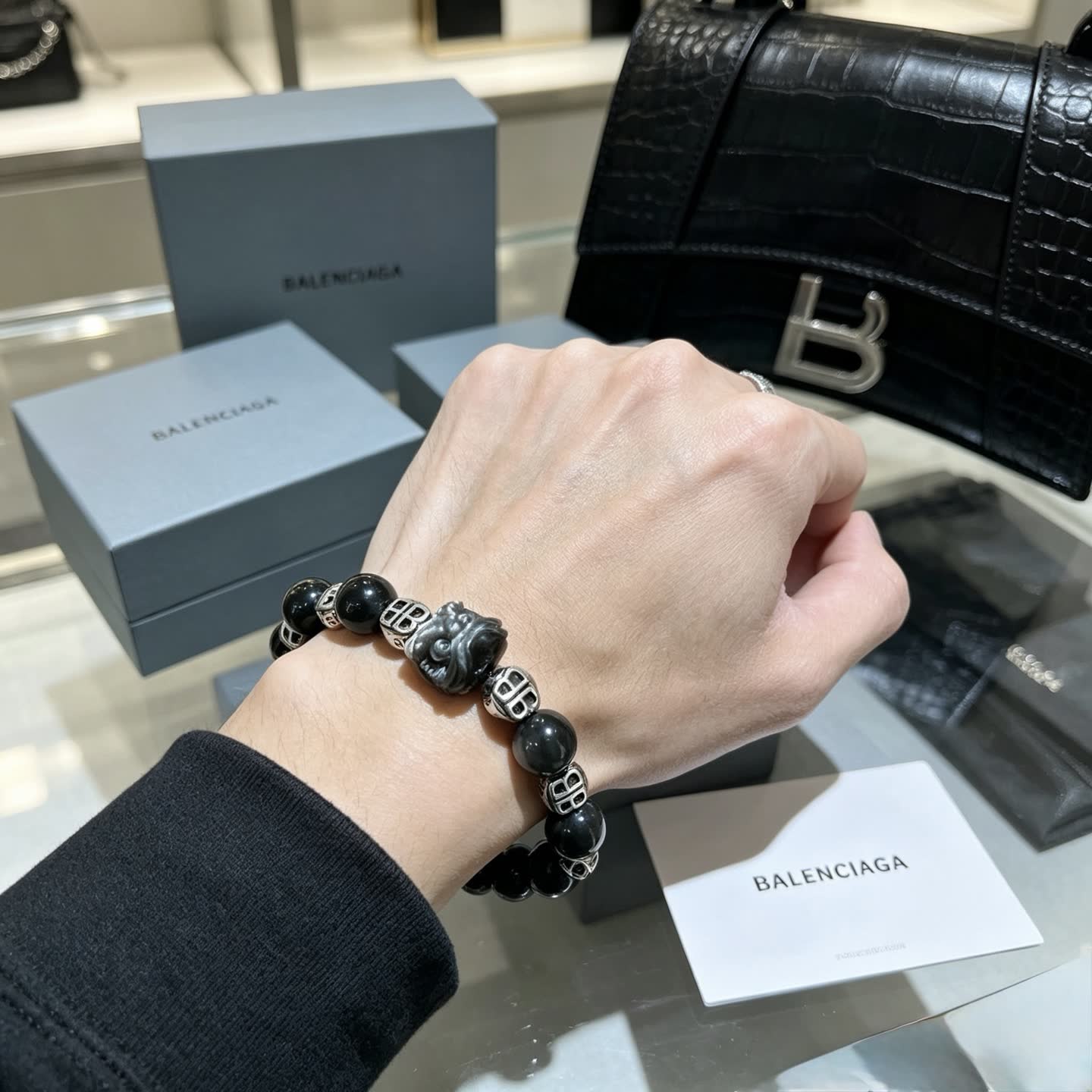 Balenciaga Black Beaded Bracelet with Lion Clasp
