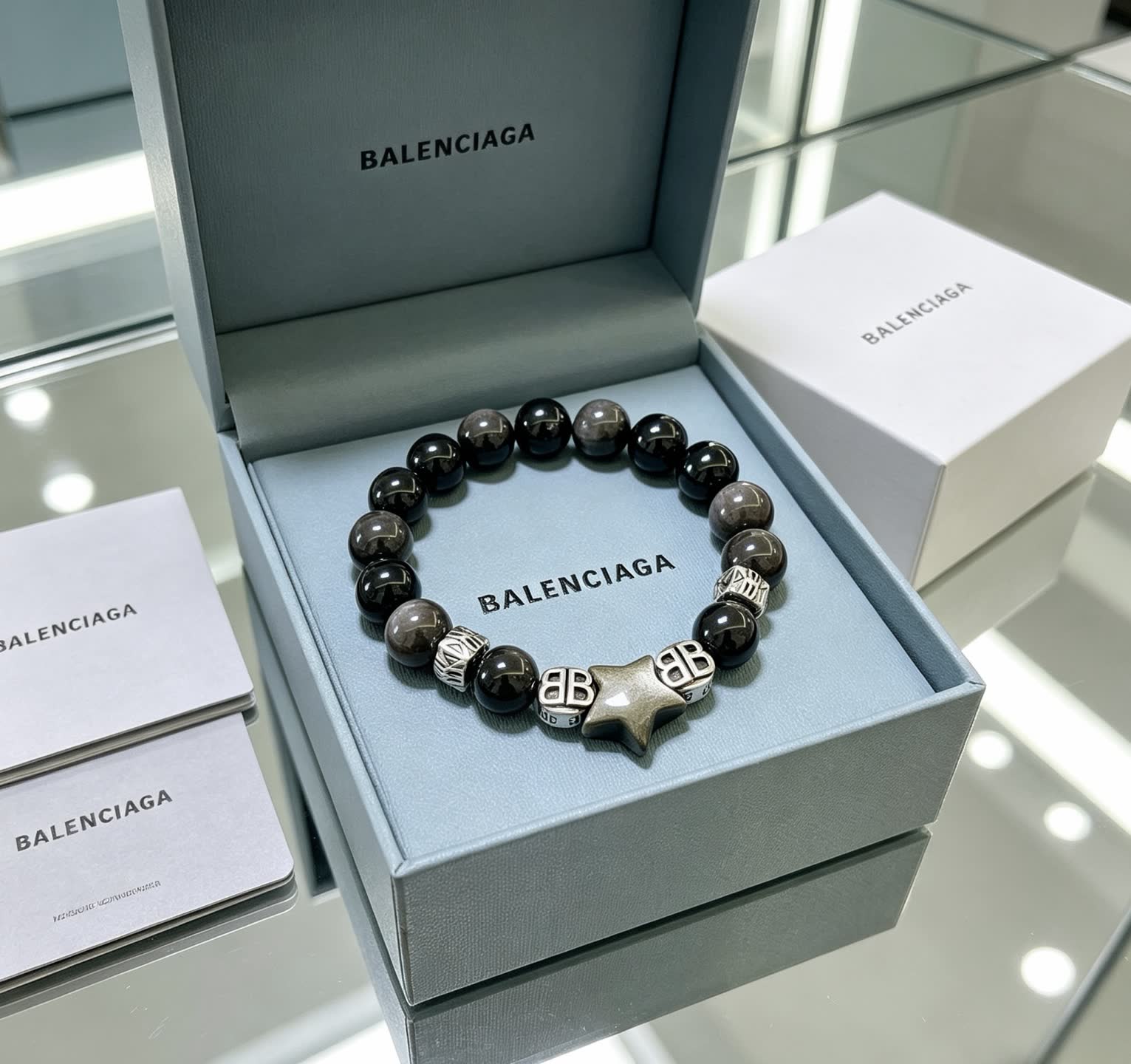 Balenciaga Black Beaded Bracelet with Star Charm Balenciaga Black Beaded Bracelet with Star Charm