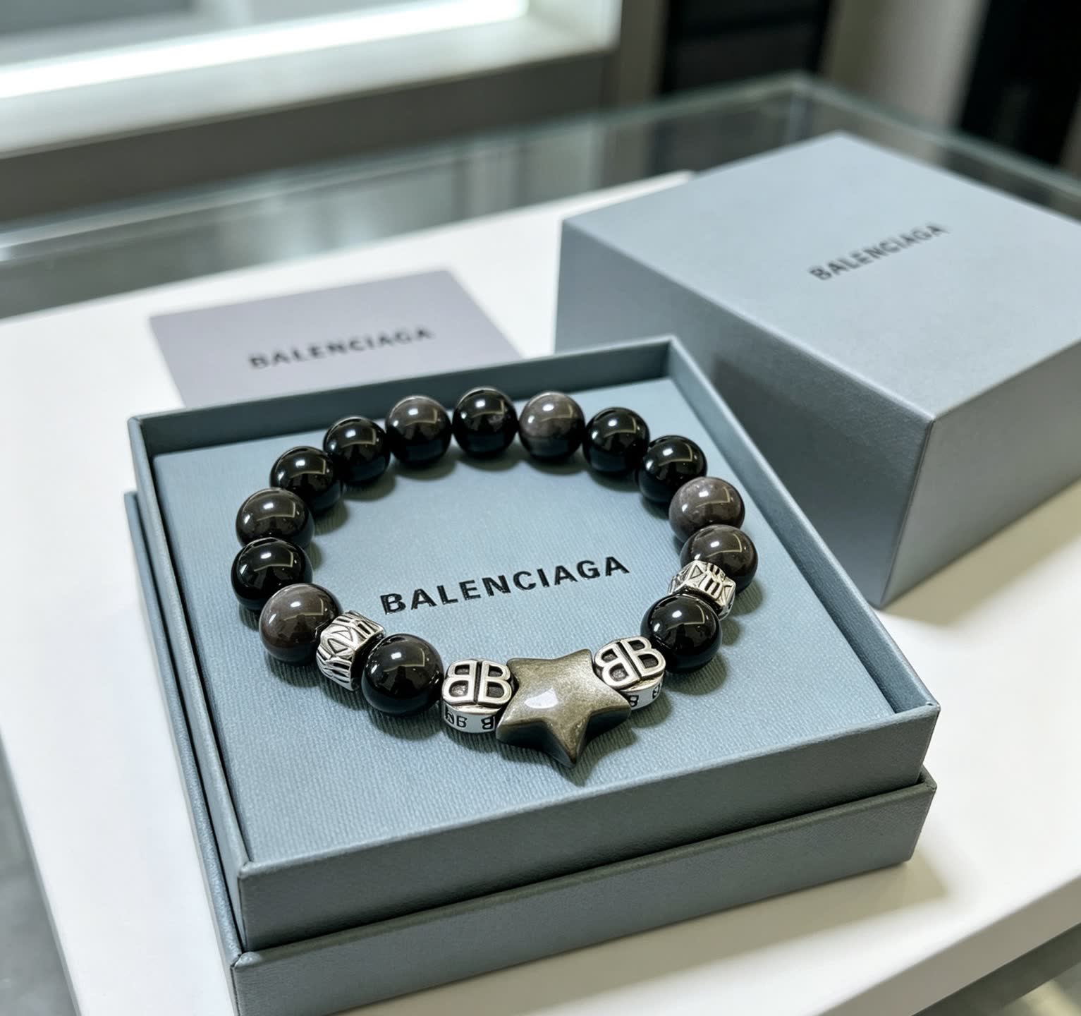Balenciaga Black Beaded Bracelet with Star Charm