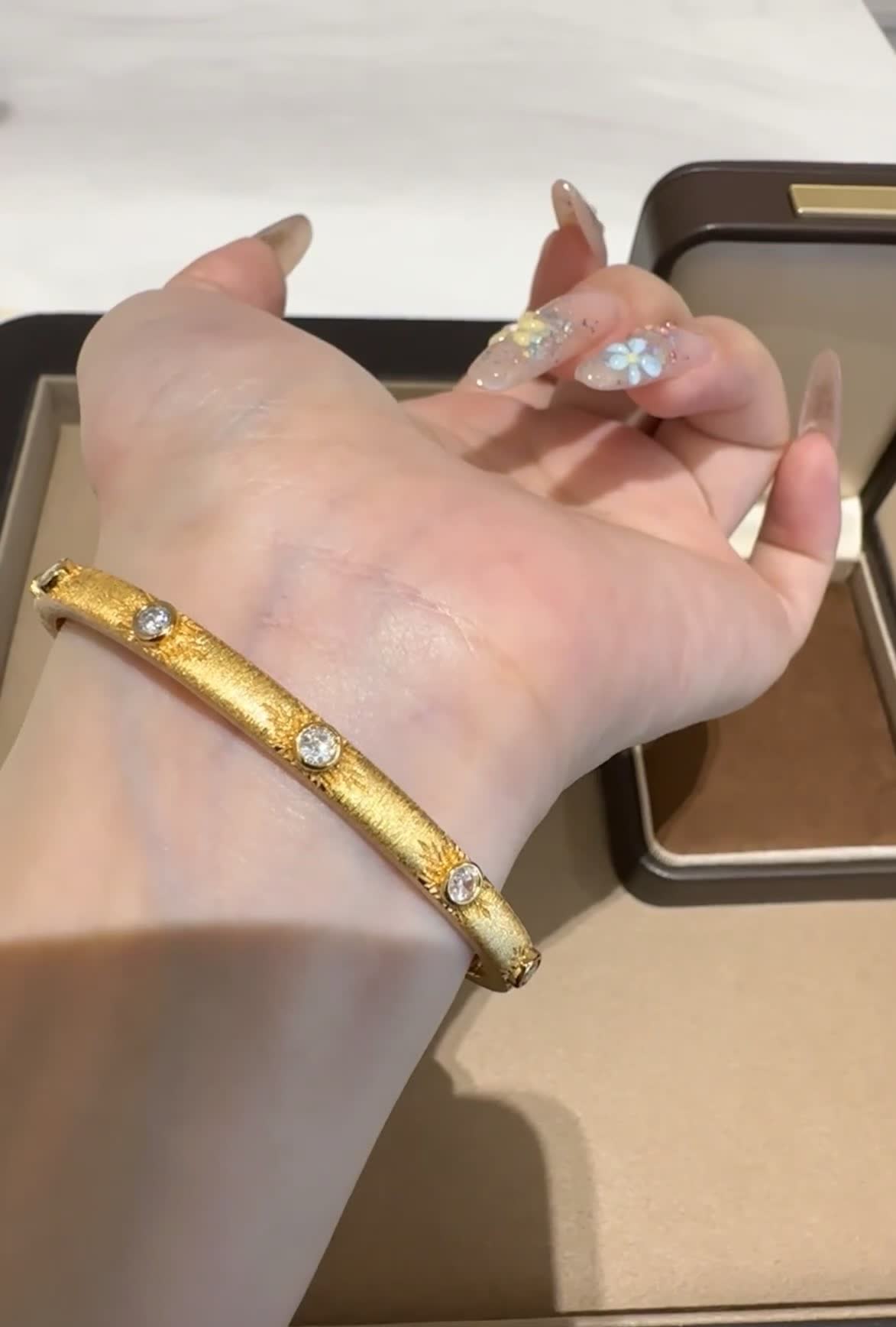 Buccellati Elegant Gold Bangle Bracelet with Crystal Accents