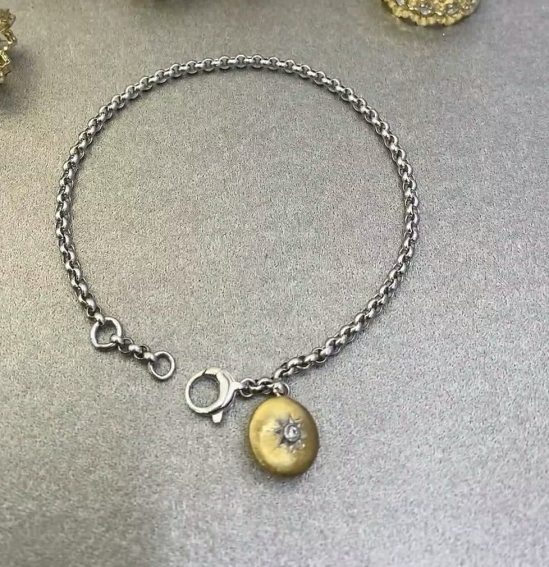 Buccellati Silver Bracelet with Gold Charm
