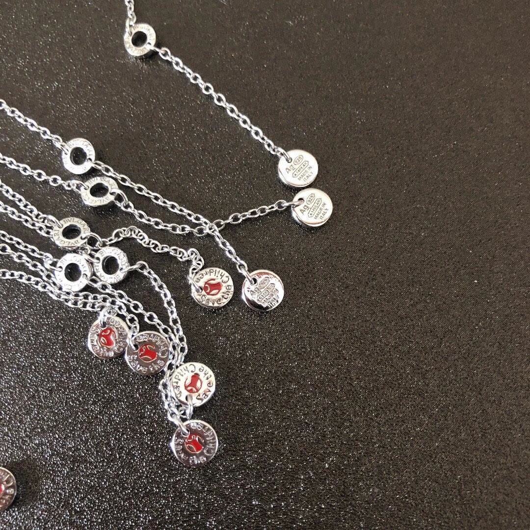 Bvlgari Silver Charm Bracelet with Red and Black Stones