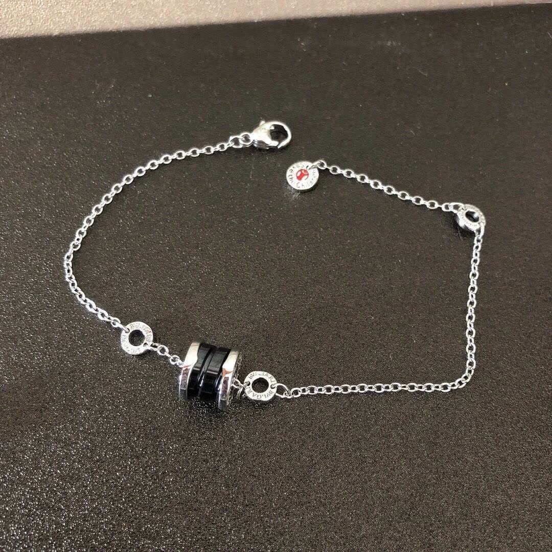 Bvlgari Silver Charm Bracelet with Red and Black Stones