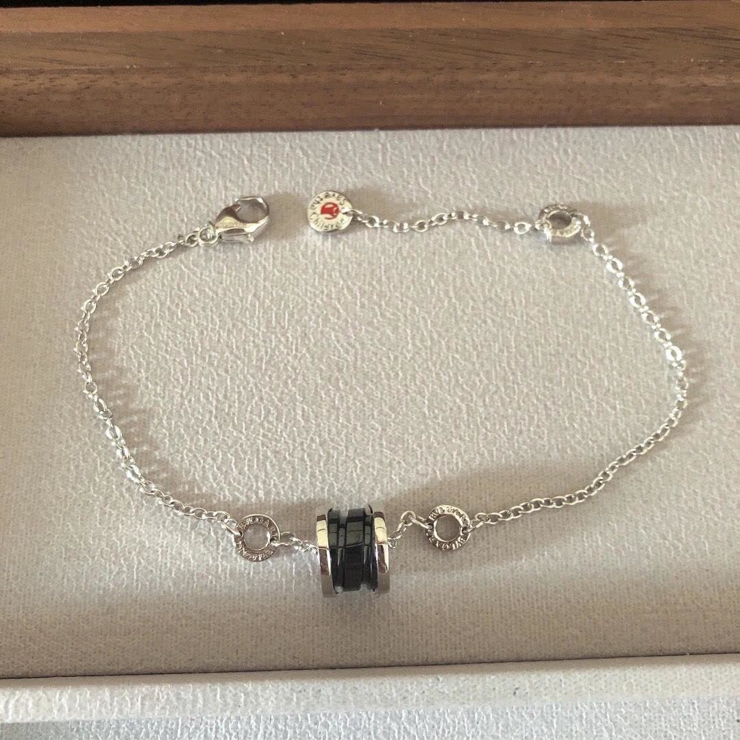 Bvlgari Silver Charm Bracelet with Red and Black Stones