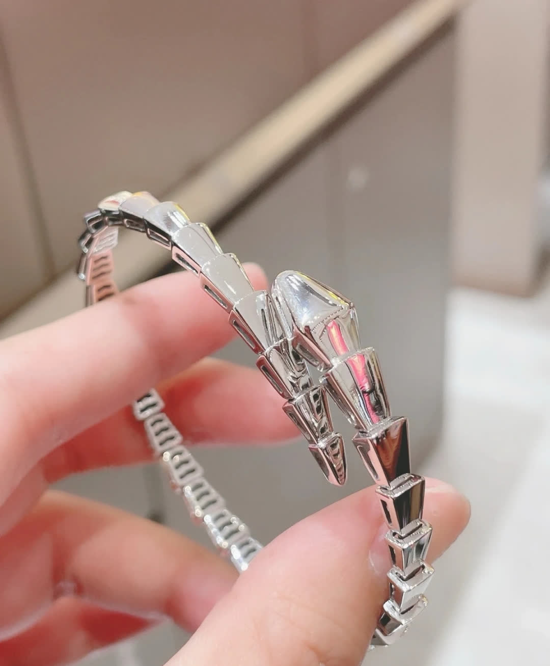 Bvlgari Silver Snake Bracelet with Blue Stones