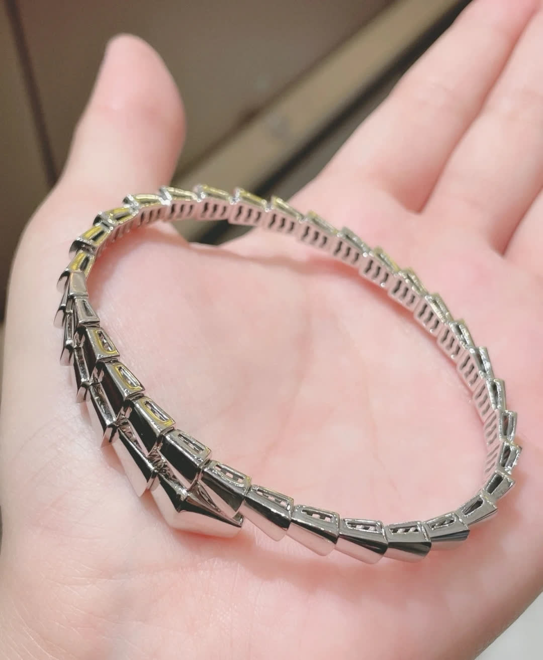 Bvlgari Silver Snake Bracelet with Blue Stones