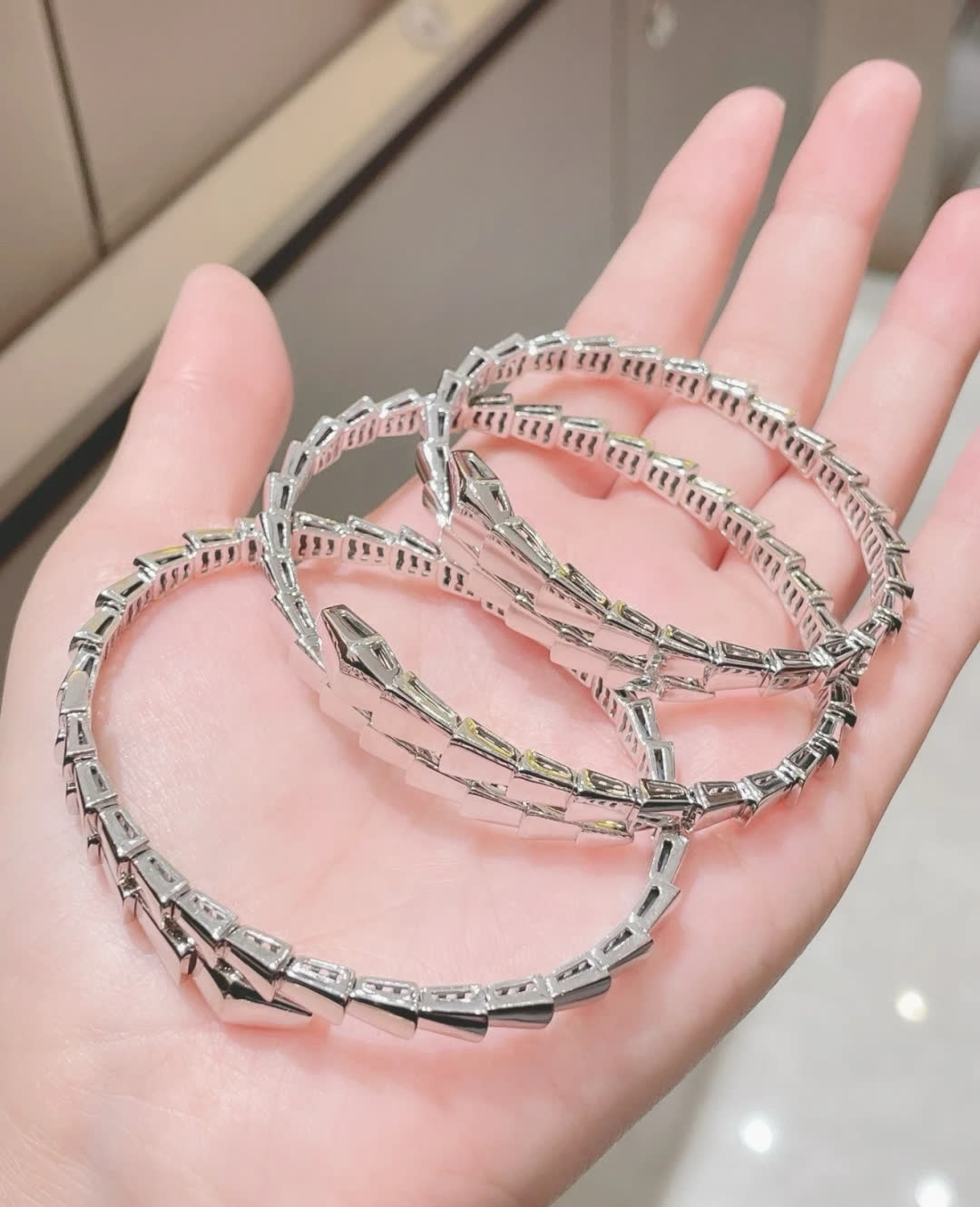 Bvlgari Silver Snake Bracelet with Blue Stones
