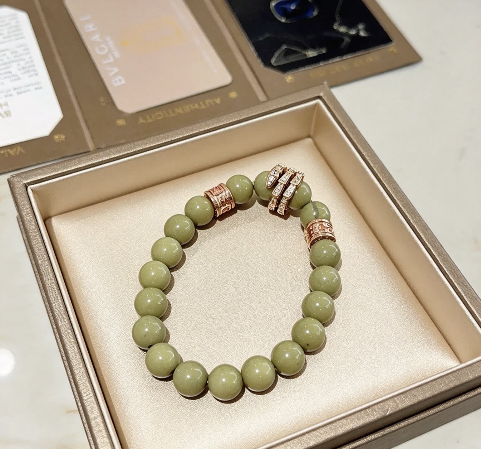 Bvlgari Green Bead Bracelet with Gold Accents