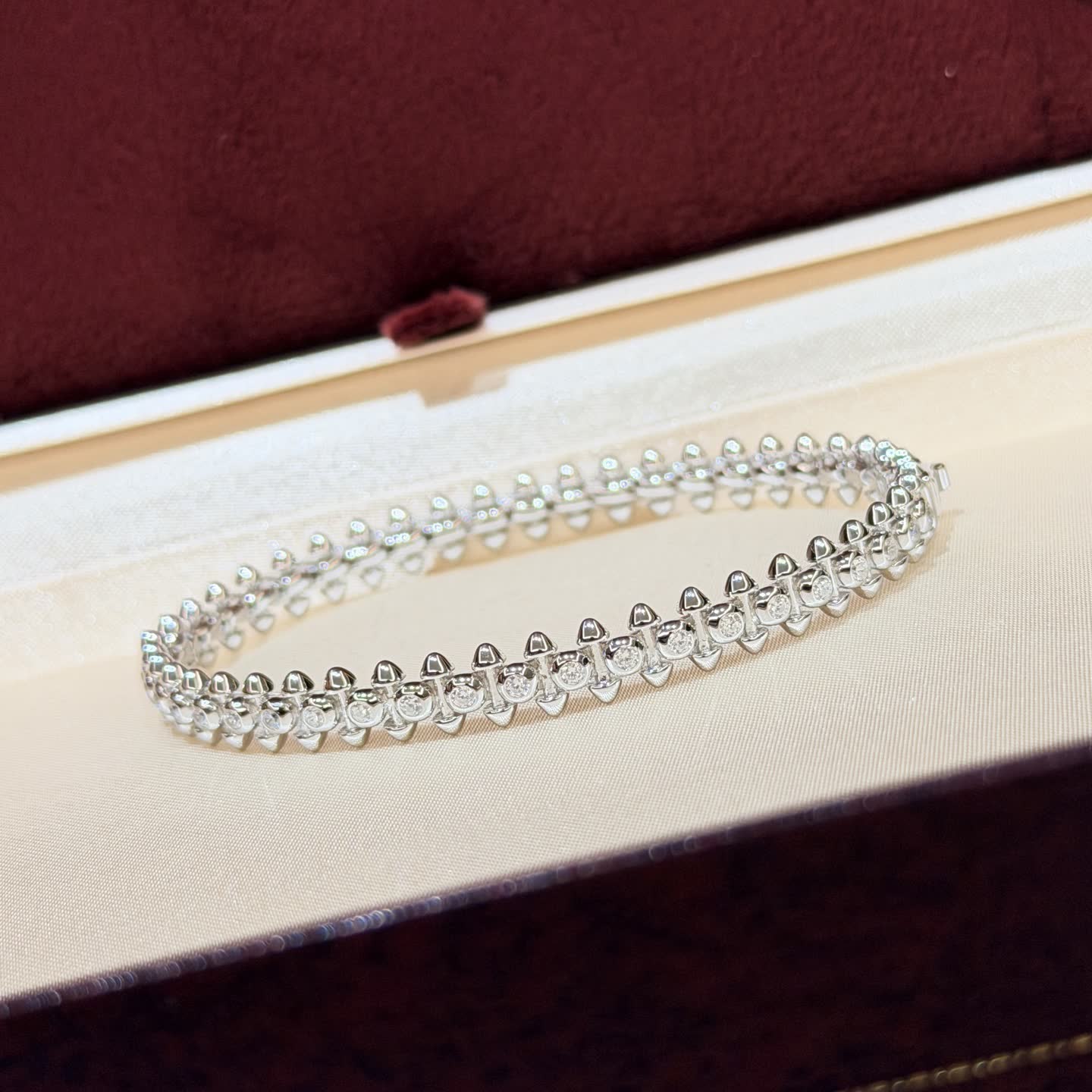 Cartier Elegant Silver Bracelet with Cubic Zirconia Stones