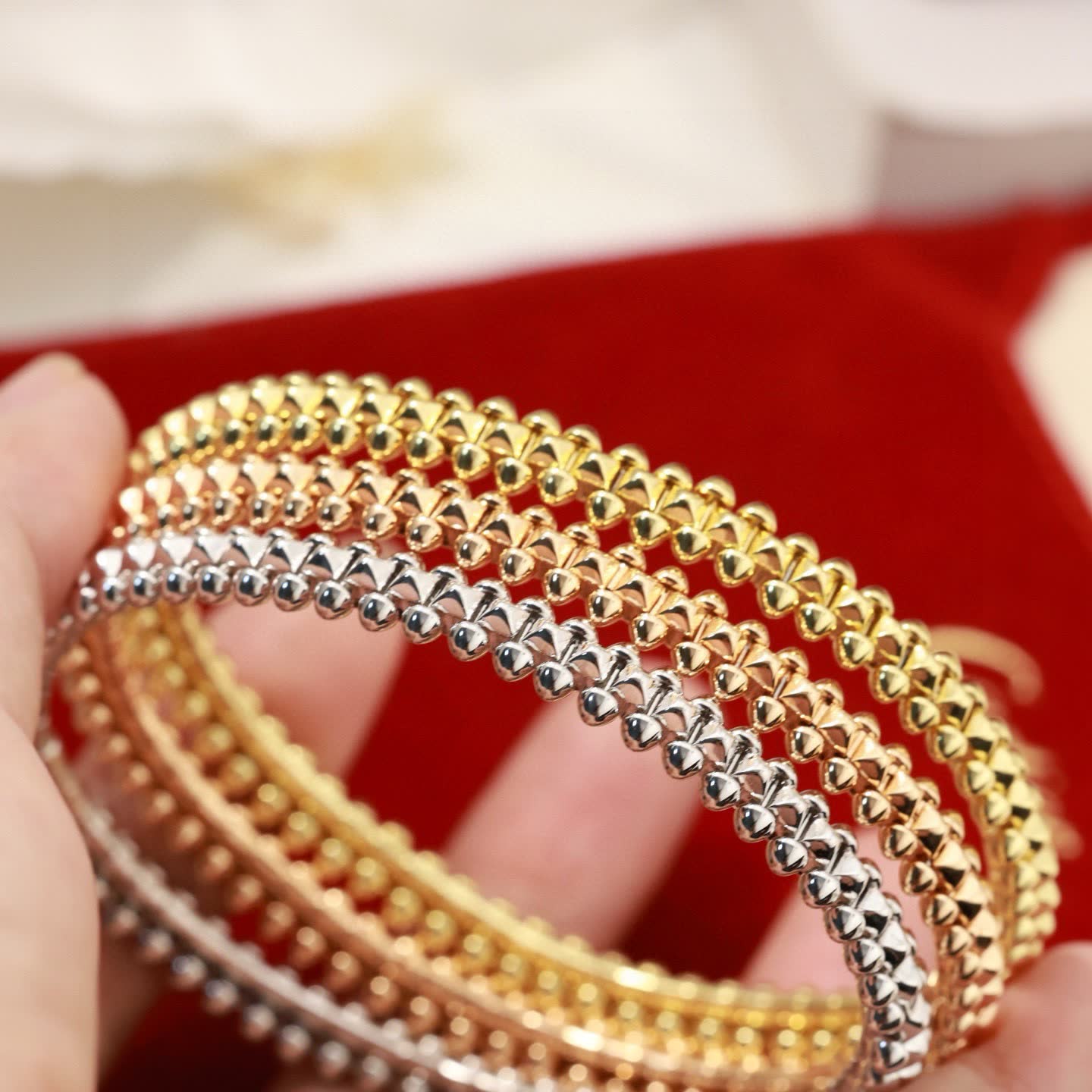 Cartier Elegant Gold and Silver Beaded Bangles Set