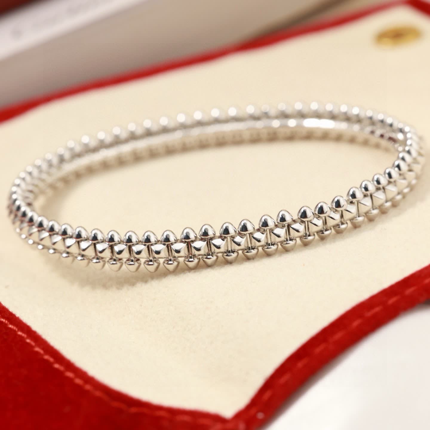 Cartier Elegant Gold and Silver Beaded Bangles Set