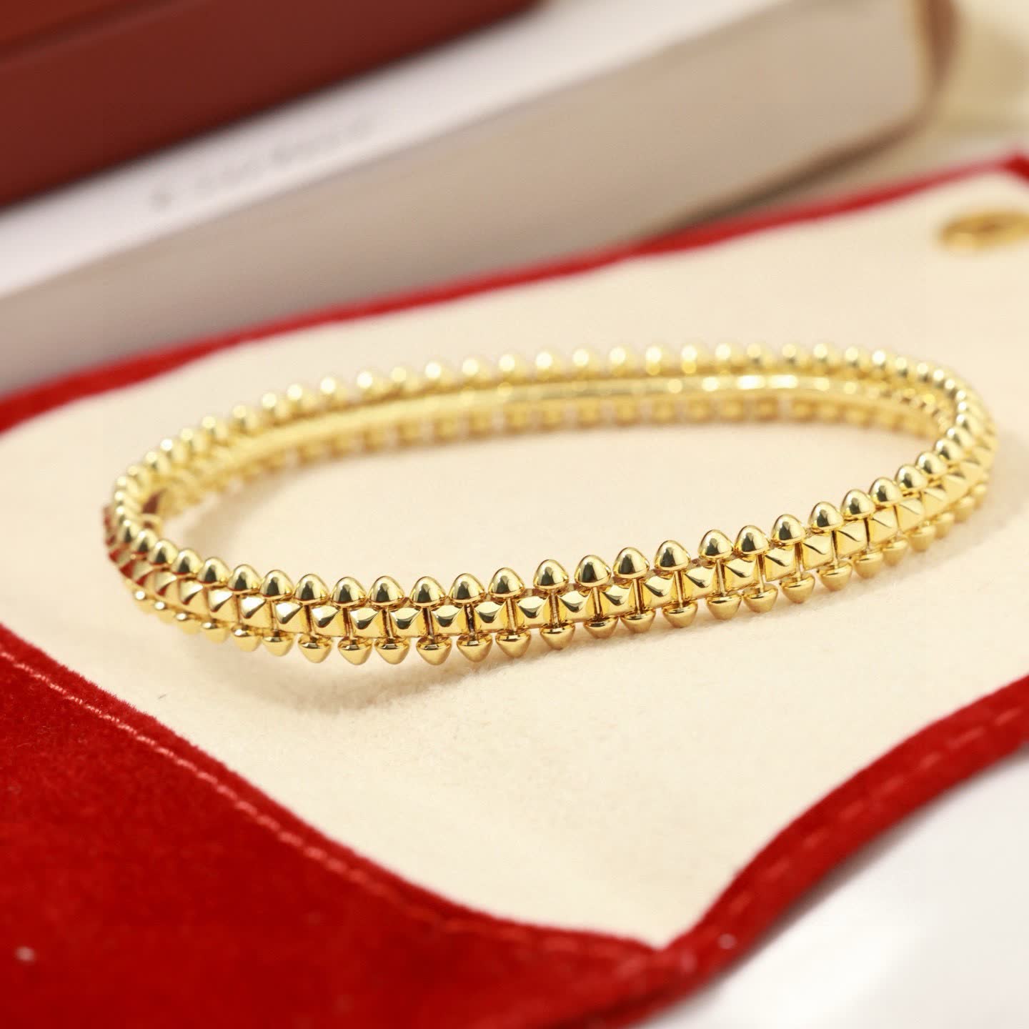 Cartier Elegant Gold and Silver Beaded Bangles Set
