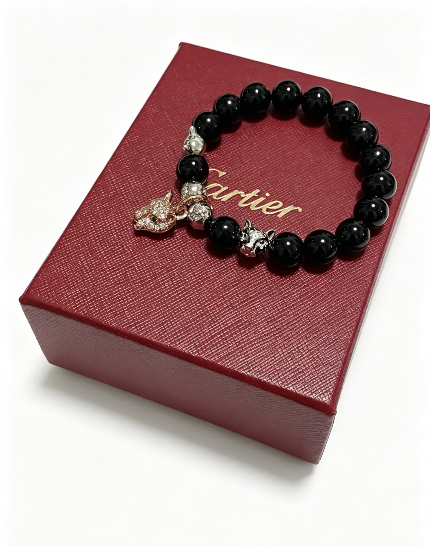 Cartier Black Onyx and Diamond Panthere Charm Bracelet