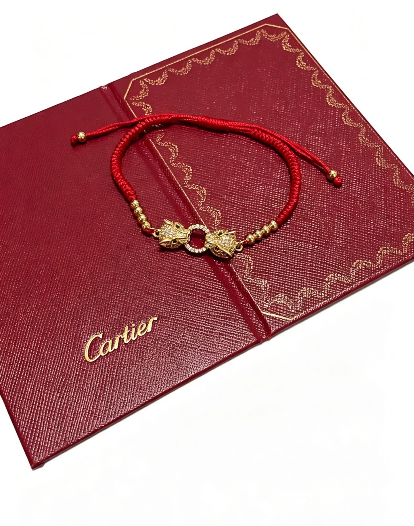 Cartier Red Silk Bracelet with Gold Beads and Diamond Clasp Cartier Red Silk Bracelet with Gold Beads and Diamond Clasp