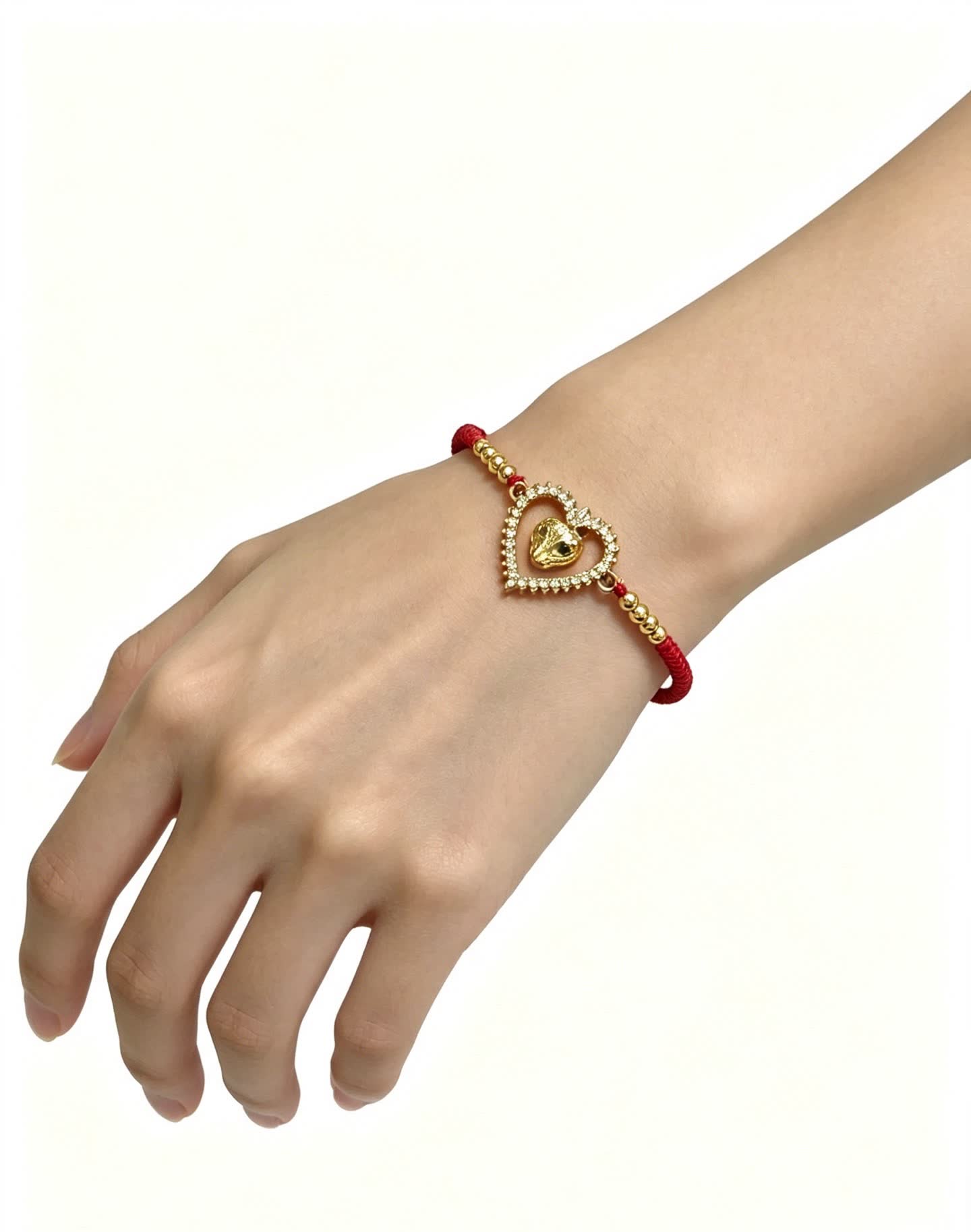 Cartier Red Rope Bracelet with Gold Heart and Animal Charm