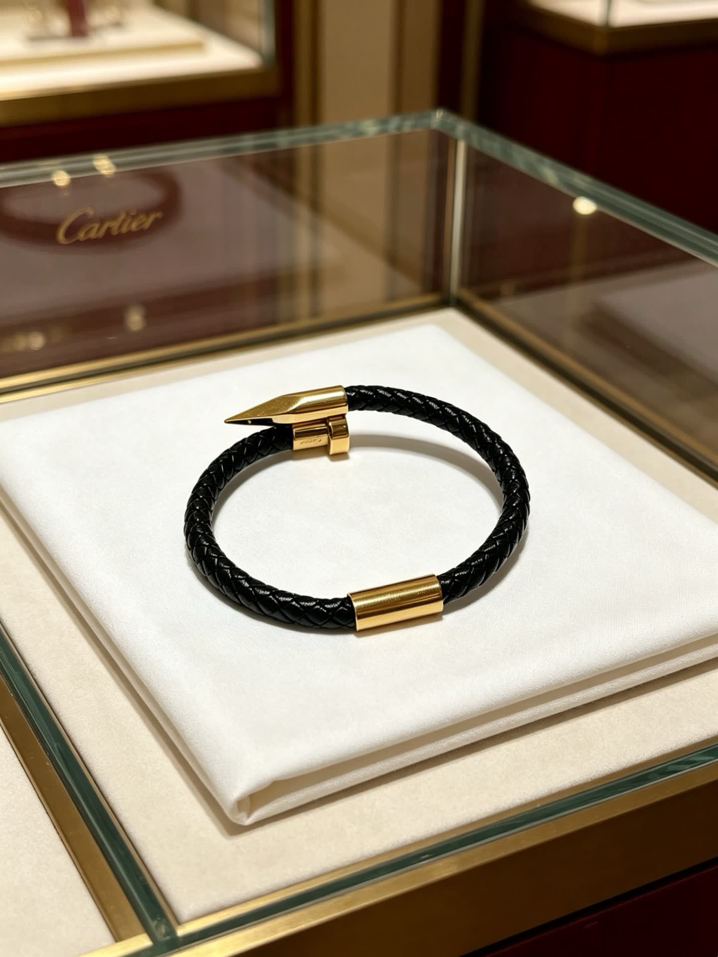 Cartier Black Braided Leather Bracelet with Gold Clasp