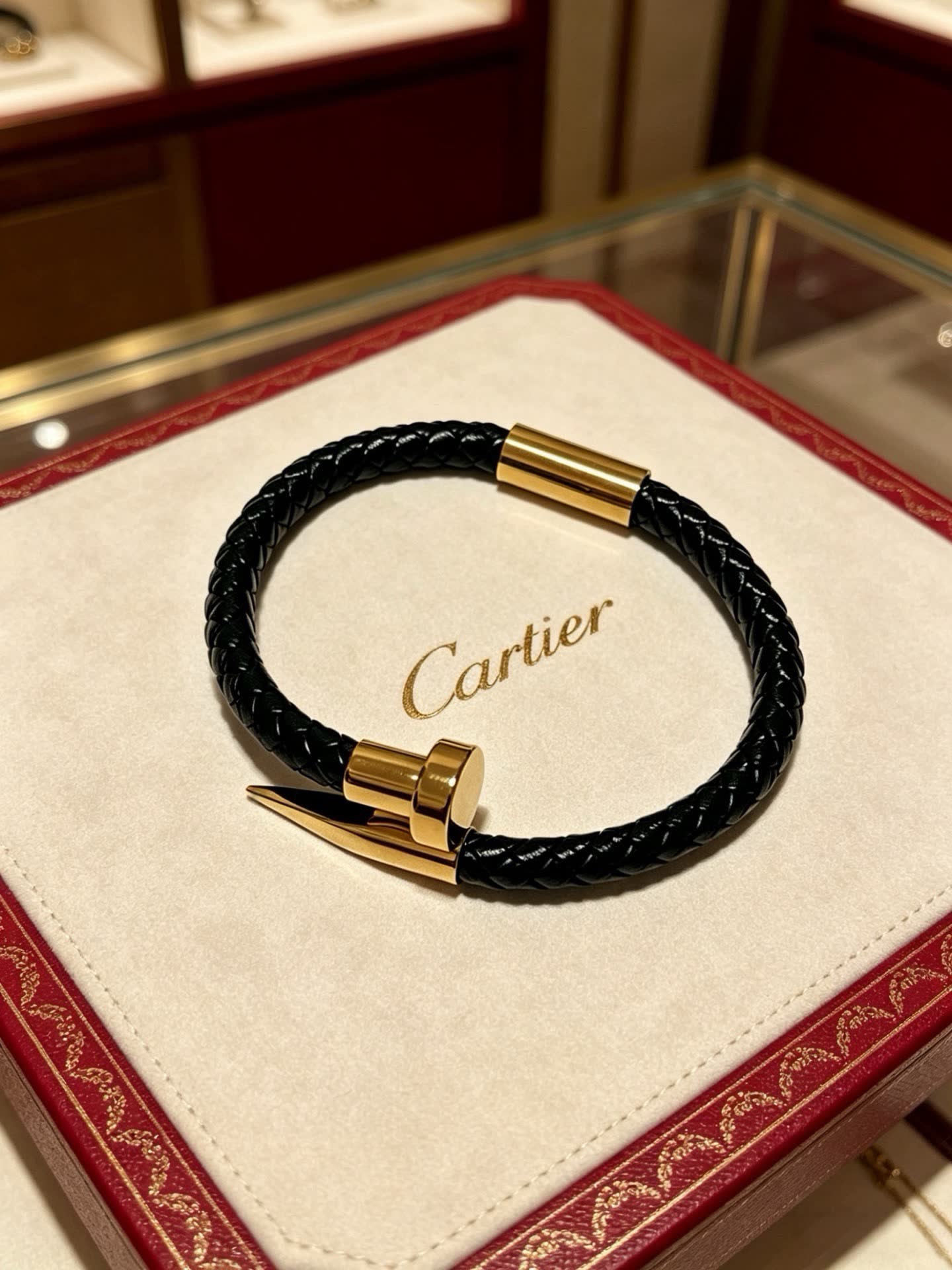 Cartier Black Braided Leather Bracelet with Gold Clasp